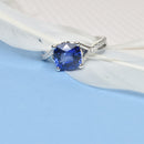 Royal Blue Cushion Cut Sapphire with a twisted band