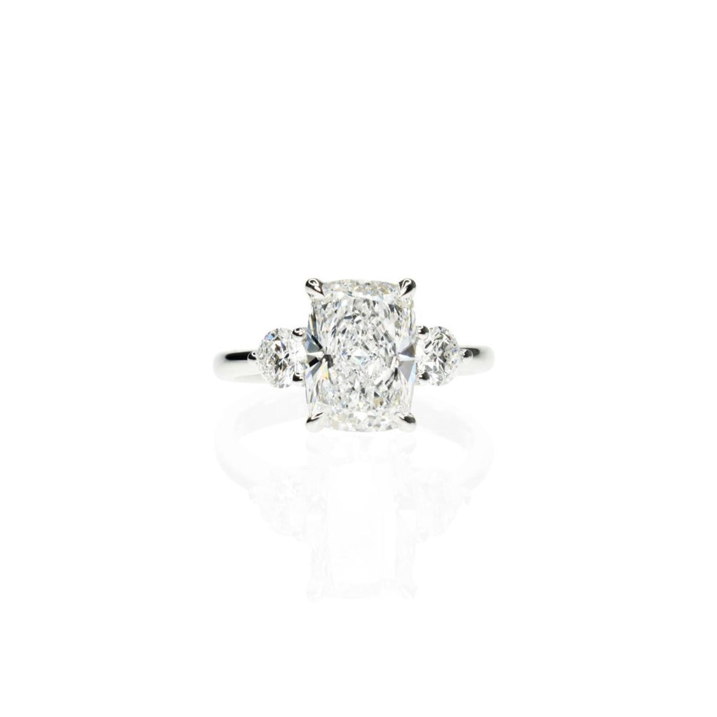 Long Cushion Cut with Round Side stones