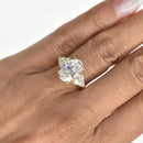3ct Oval Cut Engagement Ring with Round Diamond Cluster