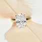 4ct Oval Shape Lab Grown Diamond Engagement Ring in a wide band and underhalo setting