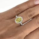Fancy Intense Yellow Oval Diamond Ring with Halo