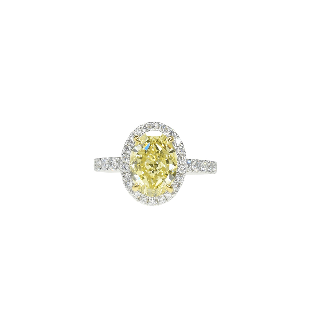 Fancy Intense Yellow Oval Diamond Ring with Halo
