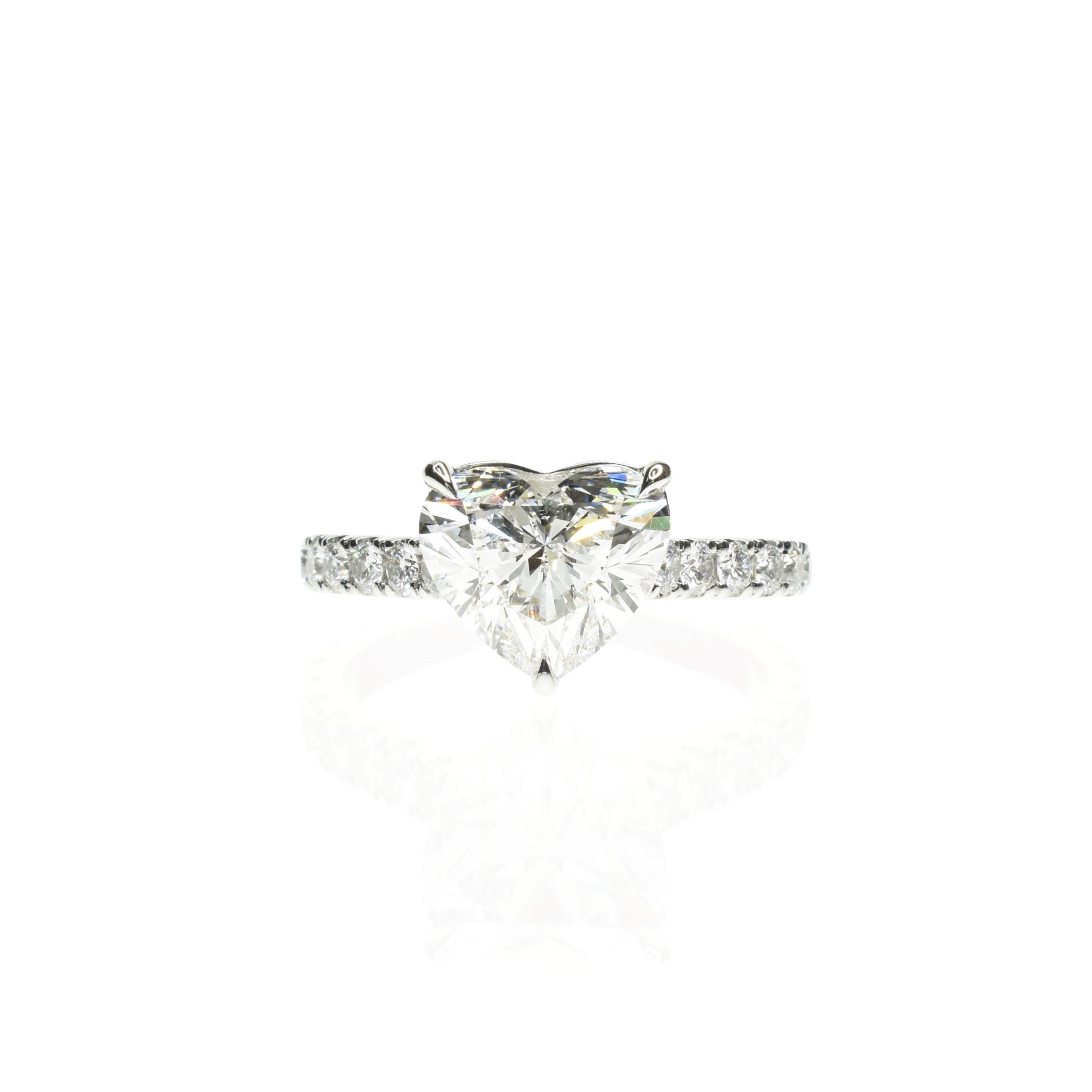 Heart Shaped Diamond Ring with a Pave Set Band