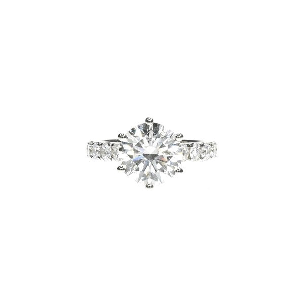 Round Brilliant Diamond with a Pave Diamond Band