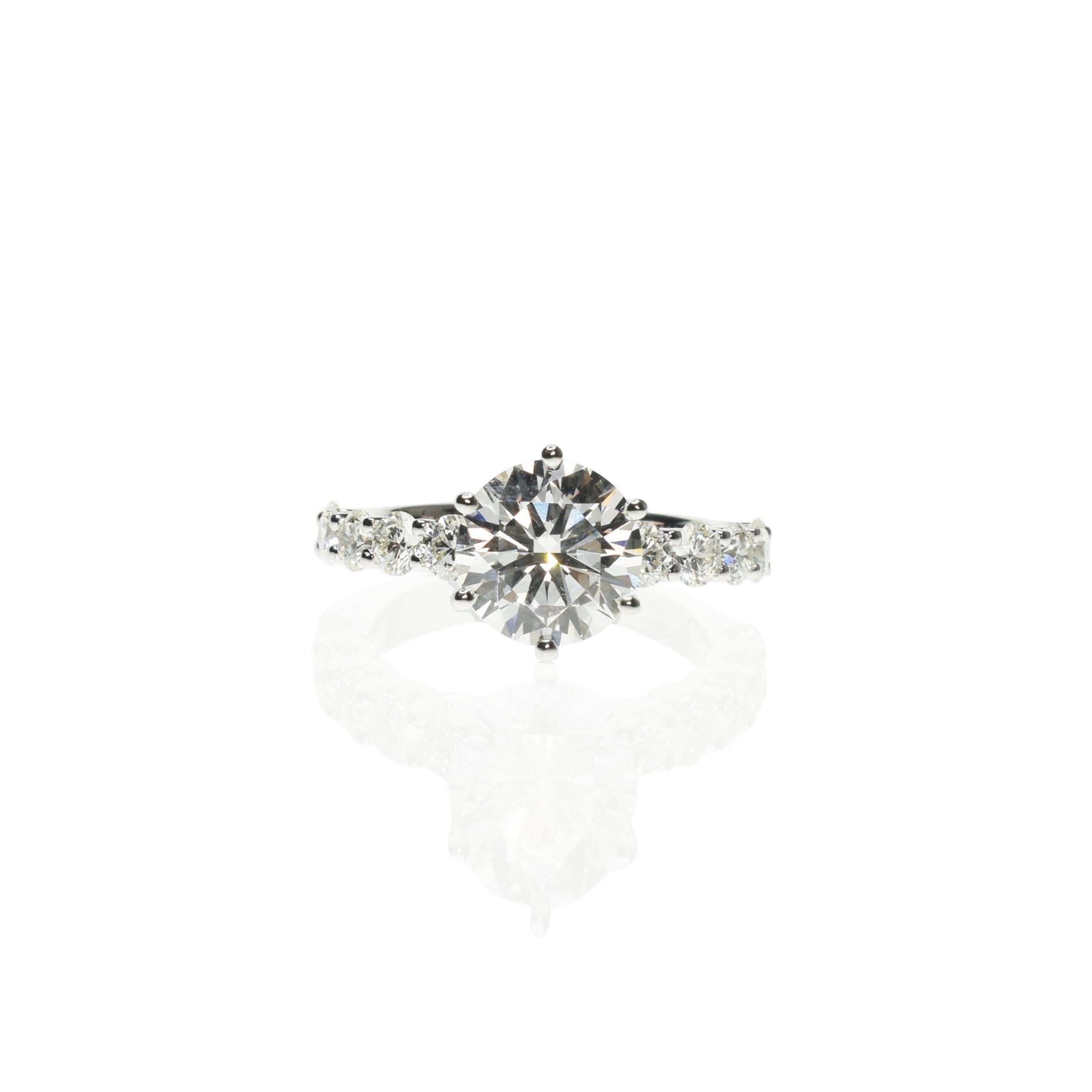 Round Diamond Ring with a Pavé Diamond Band