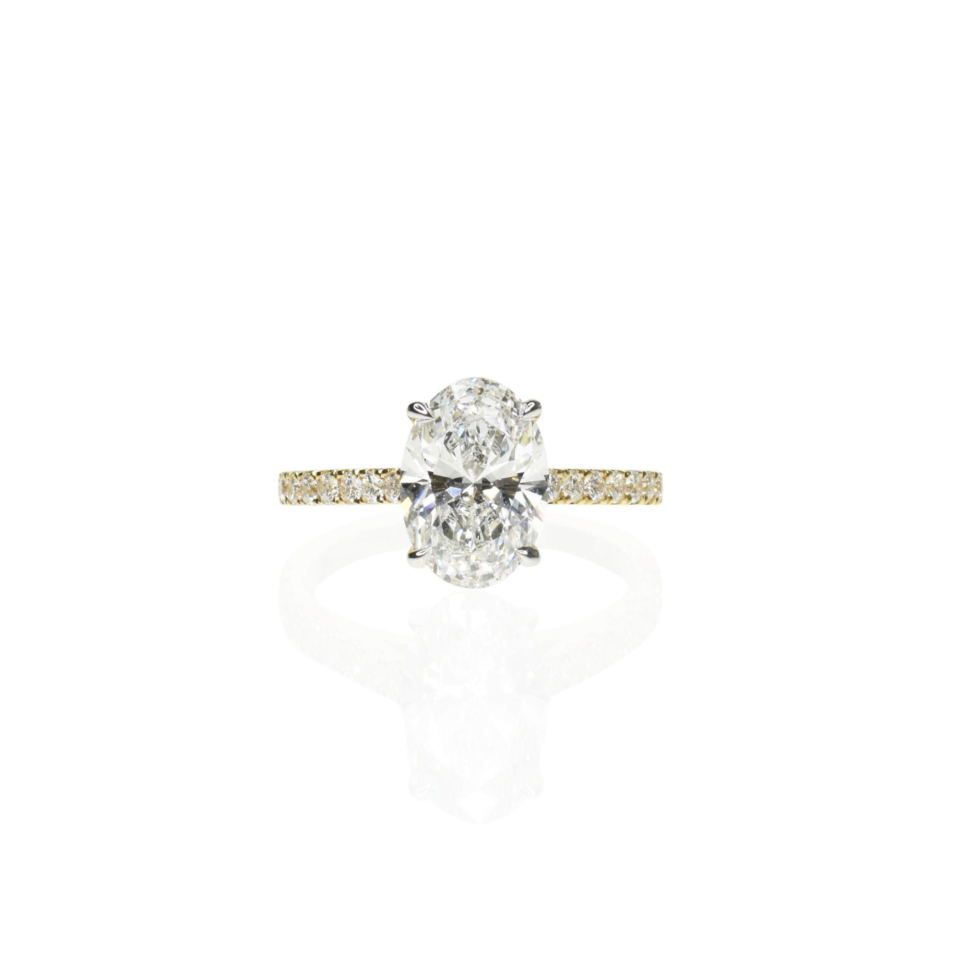 Oval diamond with Pave band