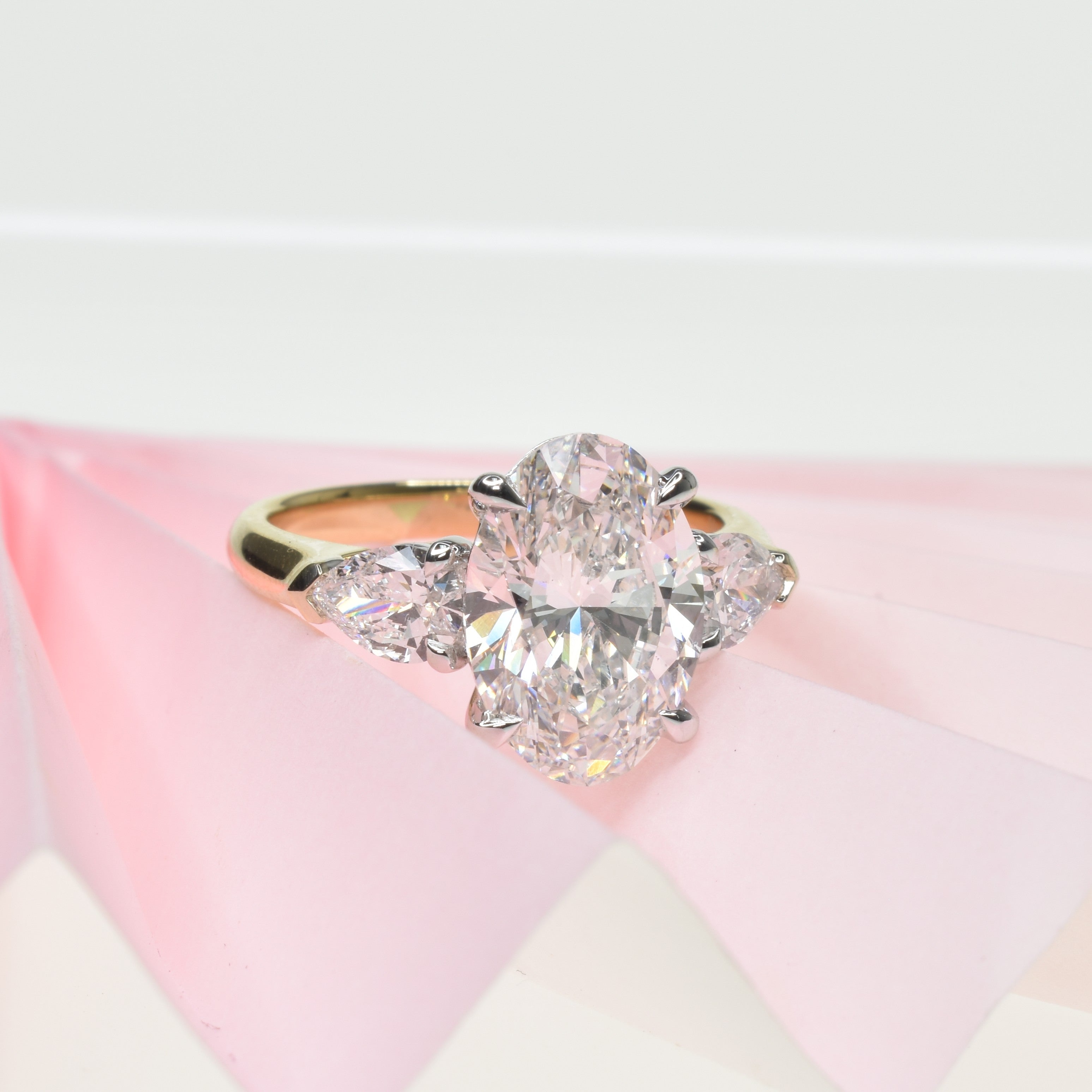 2.5ct Oval Shape Lab Grown Diamond Trilogy Ring with Pear