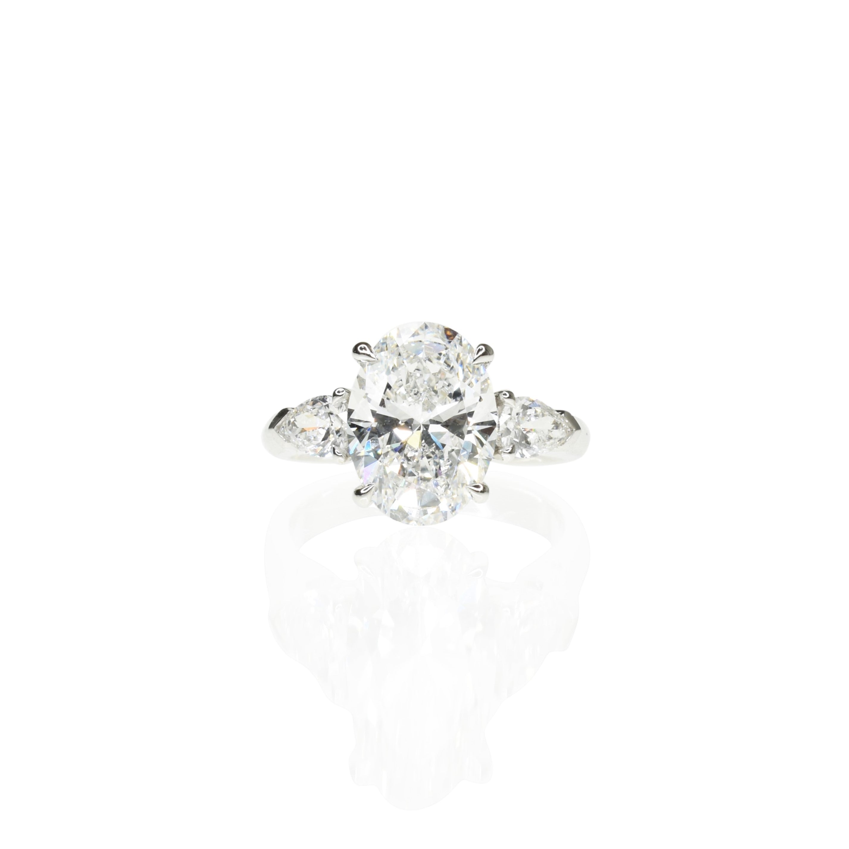 Oval Trilogy Ring With Pear Diamonds