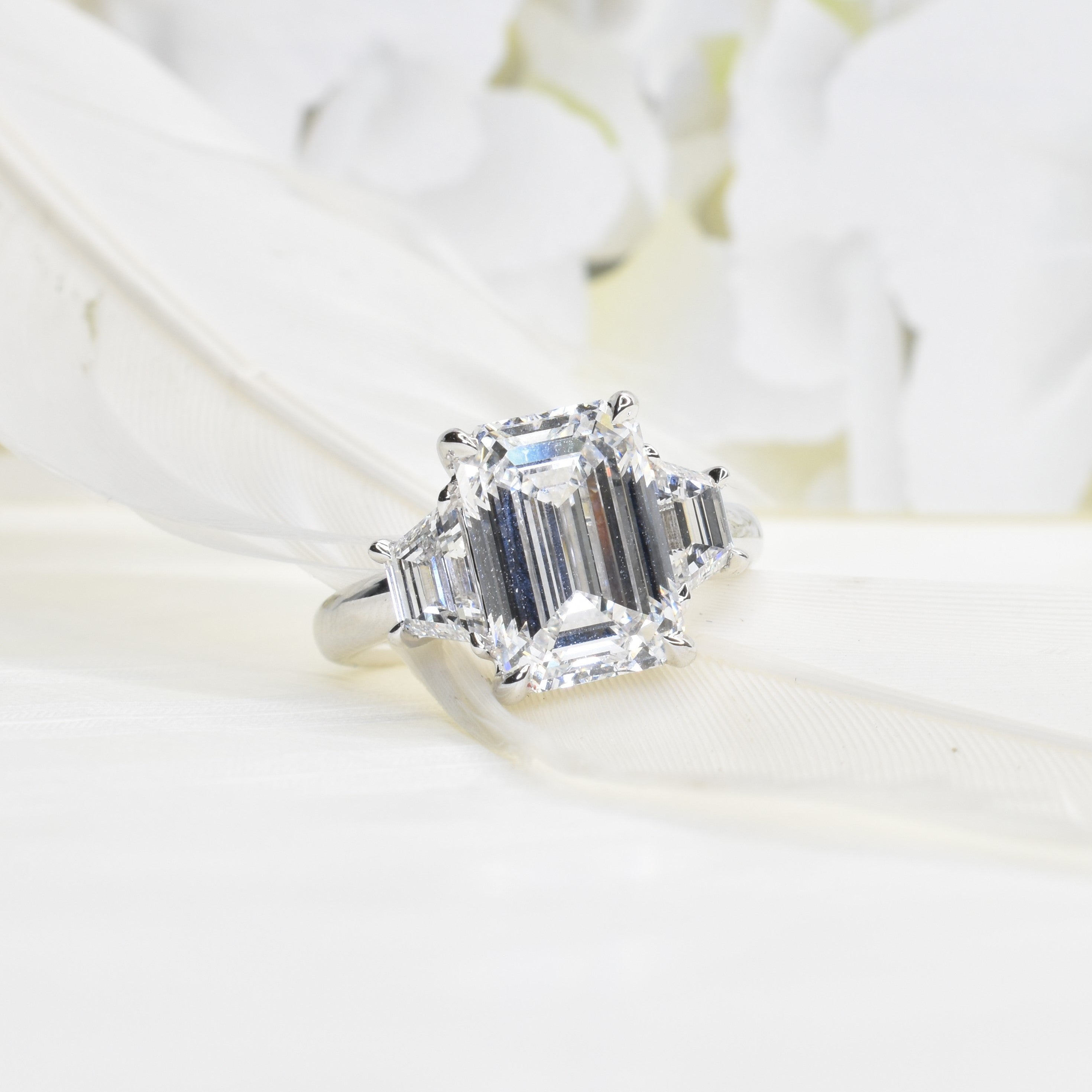 2.5ct Emerald Shape Lab Grown Diamond Trilogy Ring with Trapezoids