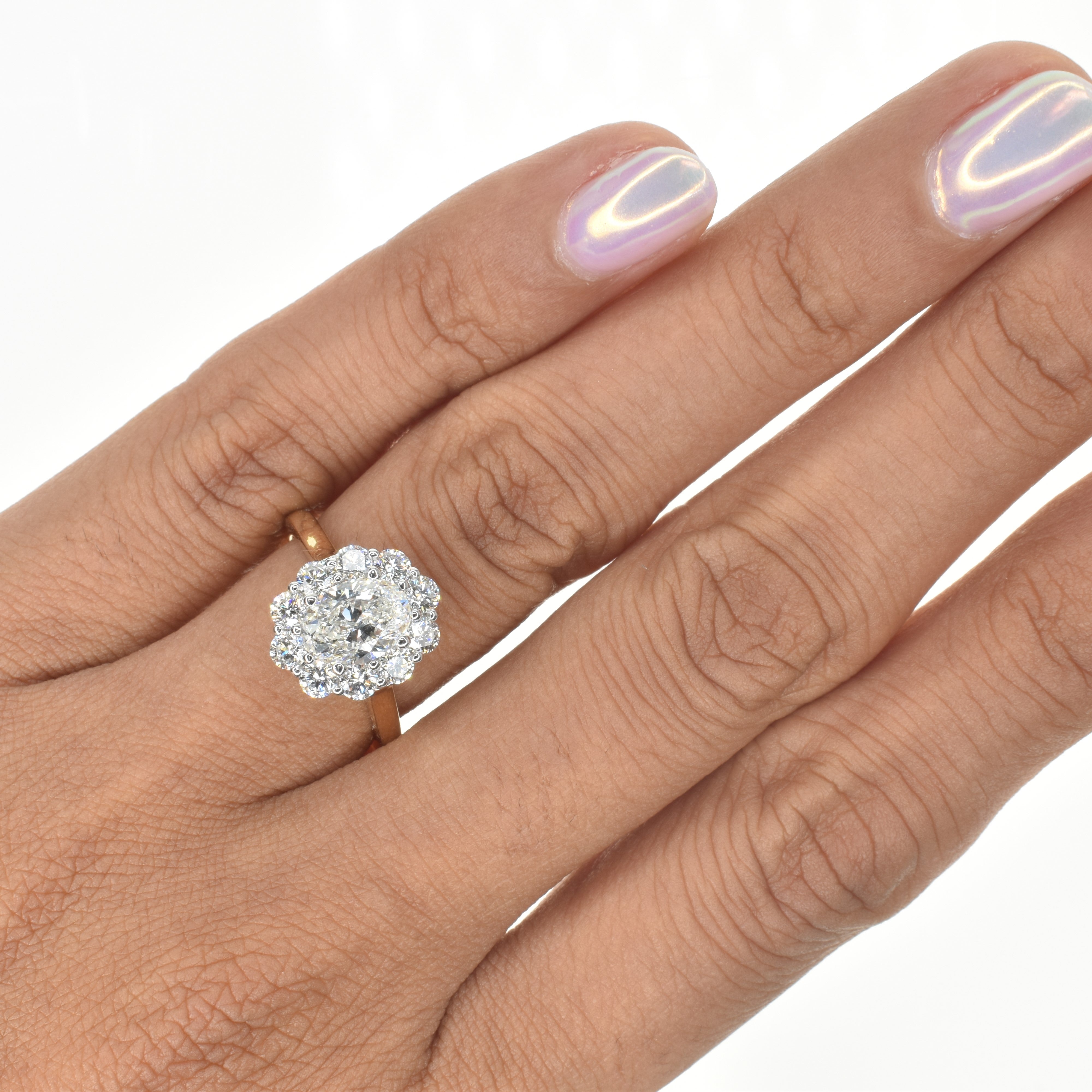 Oval Diamond Engagement Ring with Floral Halo