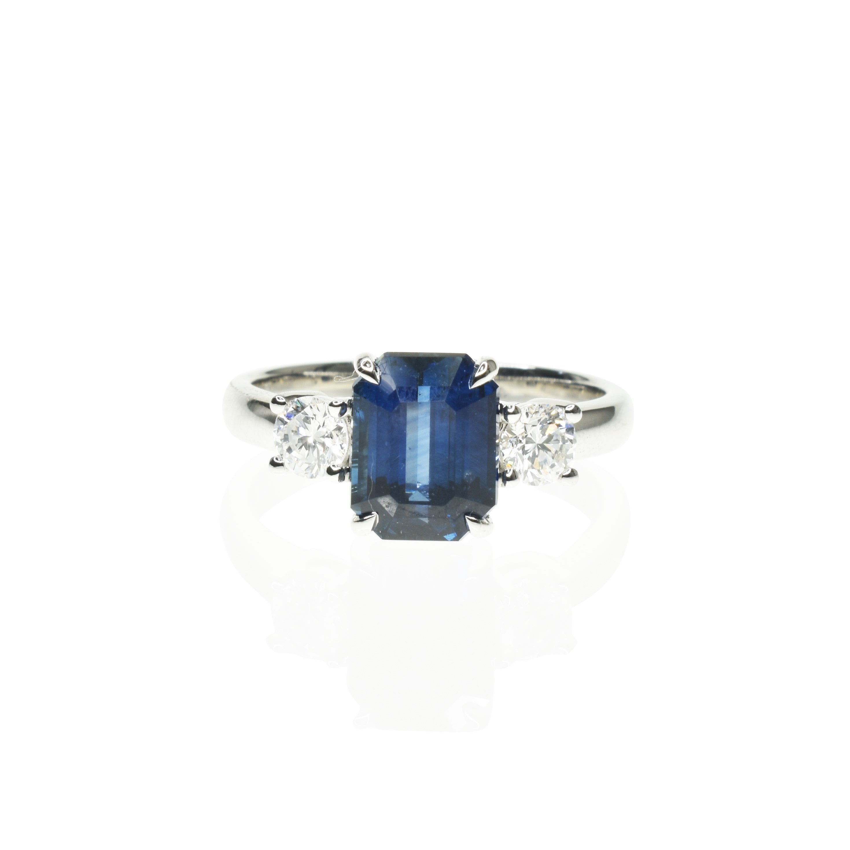 Octagonal Sapphire triology with Round shoulder Diamonds