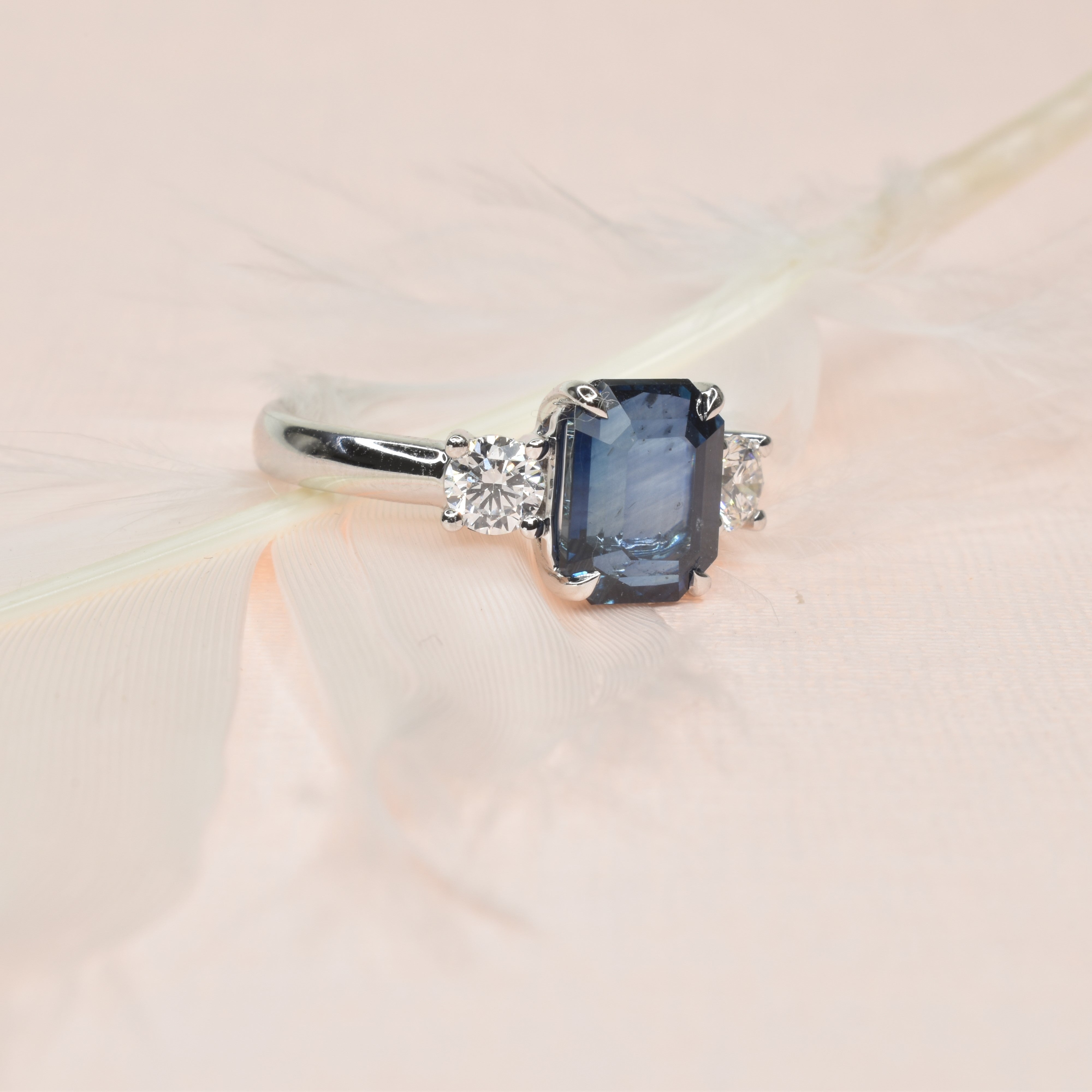 Octagonal Sapphire triology with Round shoulder Diamonds