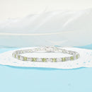 Emerald Cut Diamond and Round Peridot Bracelet