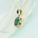 Bezel Set Emerald Pendant with Enamel