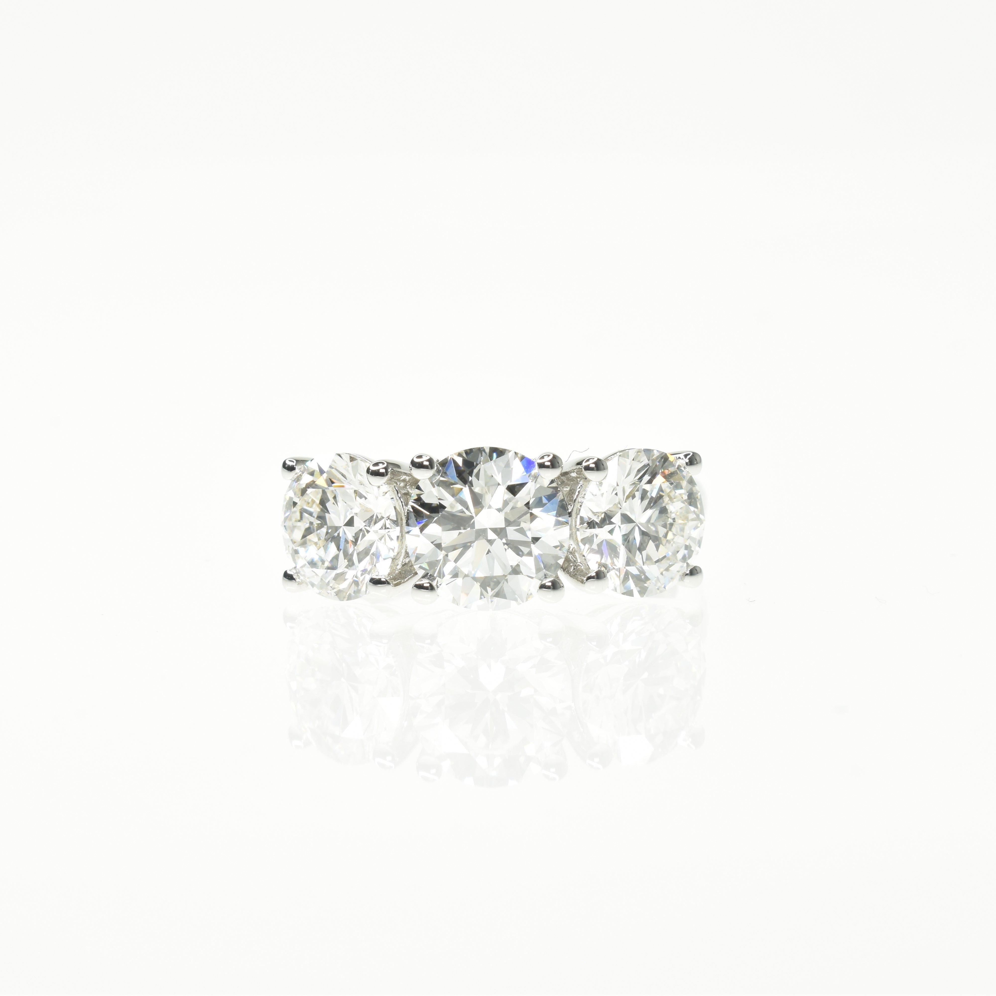 Round Brilliant Trilogy Engagement Ring