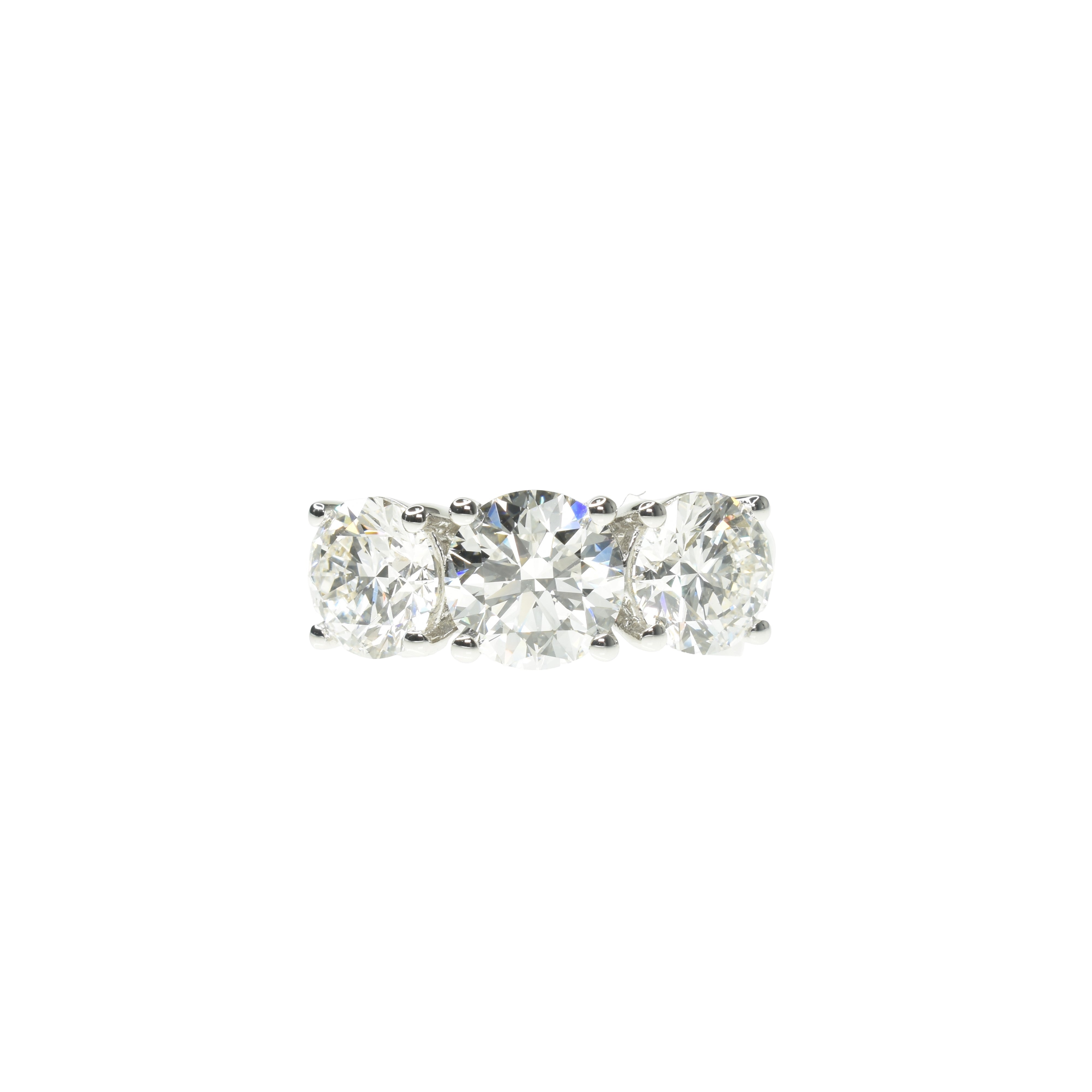 Round Brilliant Trilogy Engagement Ring