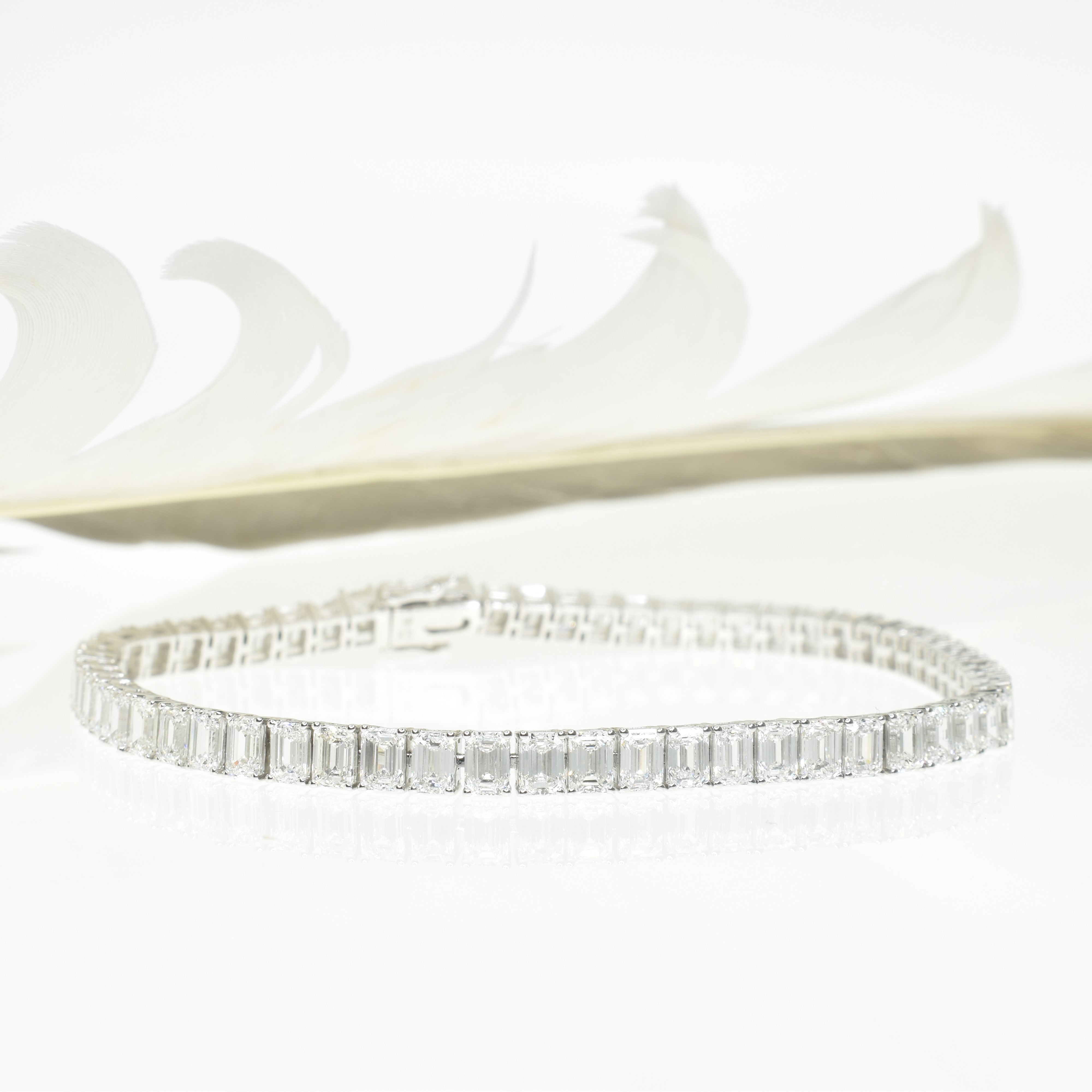 Emerald Cut Tennis Bracelet with 0.15ct Diamonds