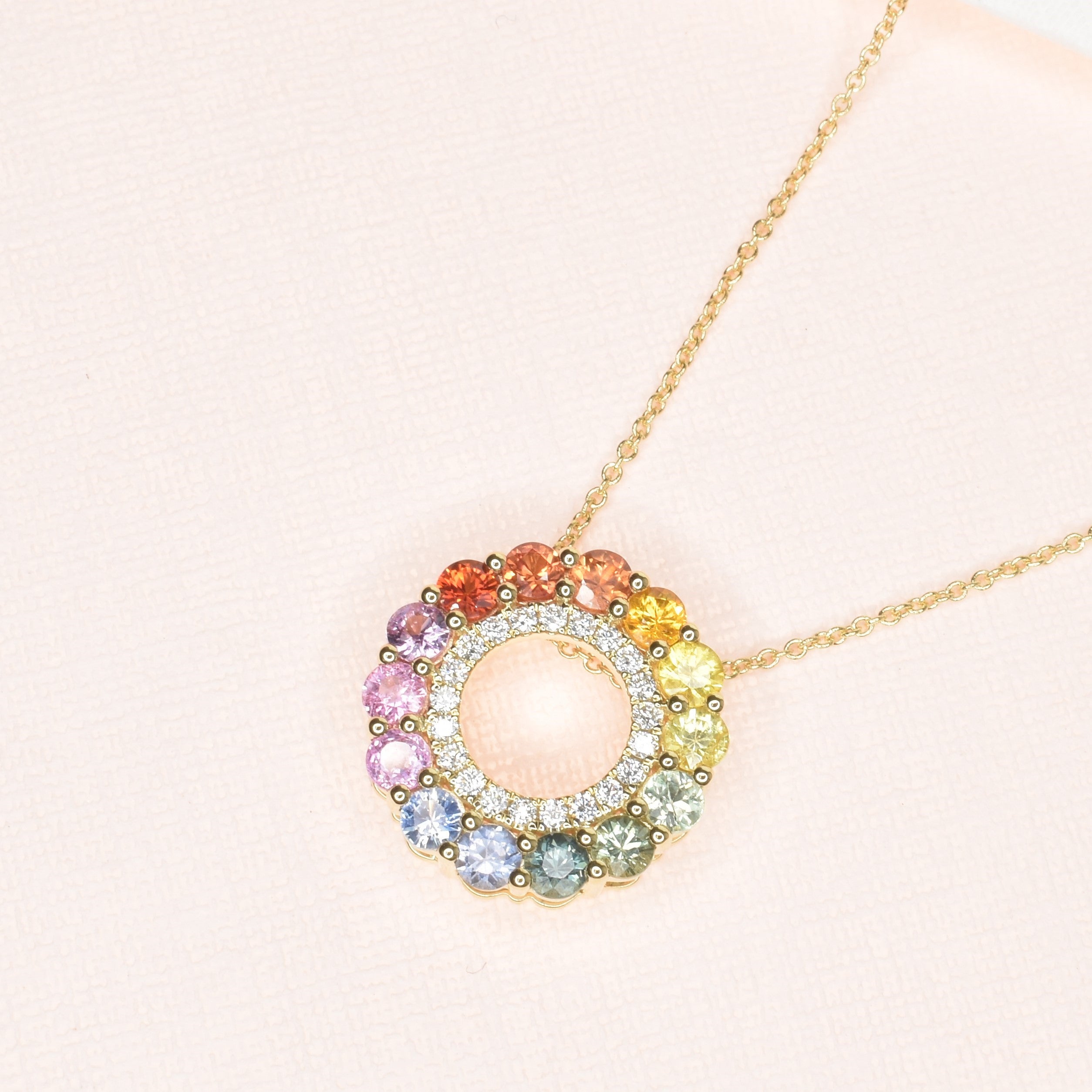 Rainbow sapphire with diamonds pendant