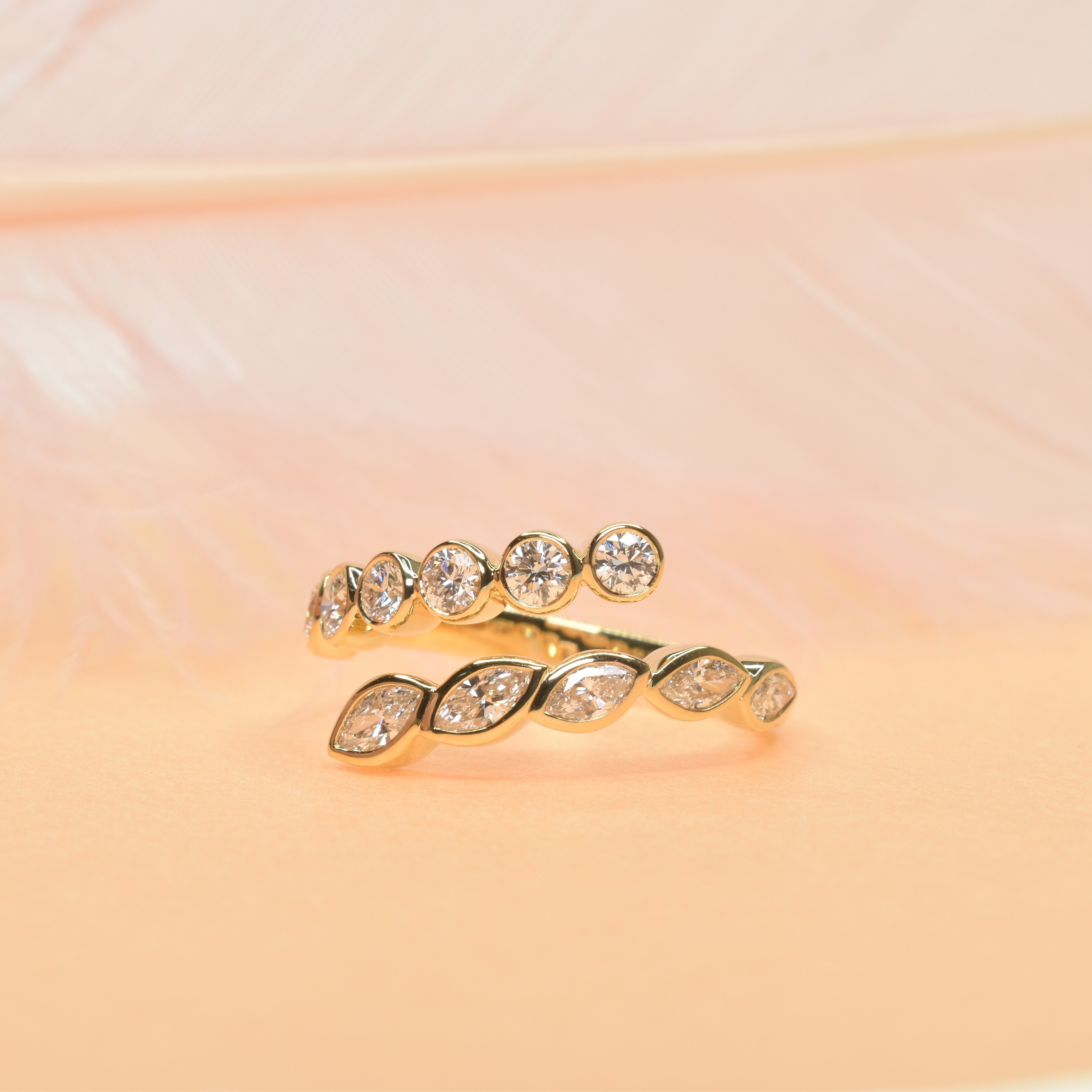 Marquise and Round Diamonds Crossover Ring