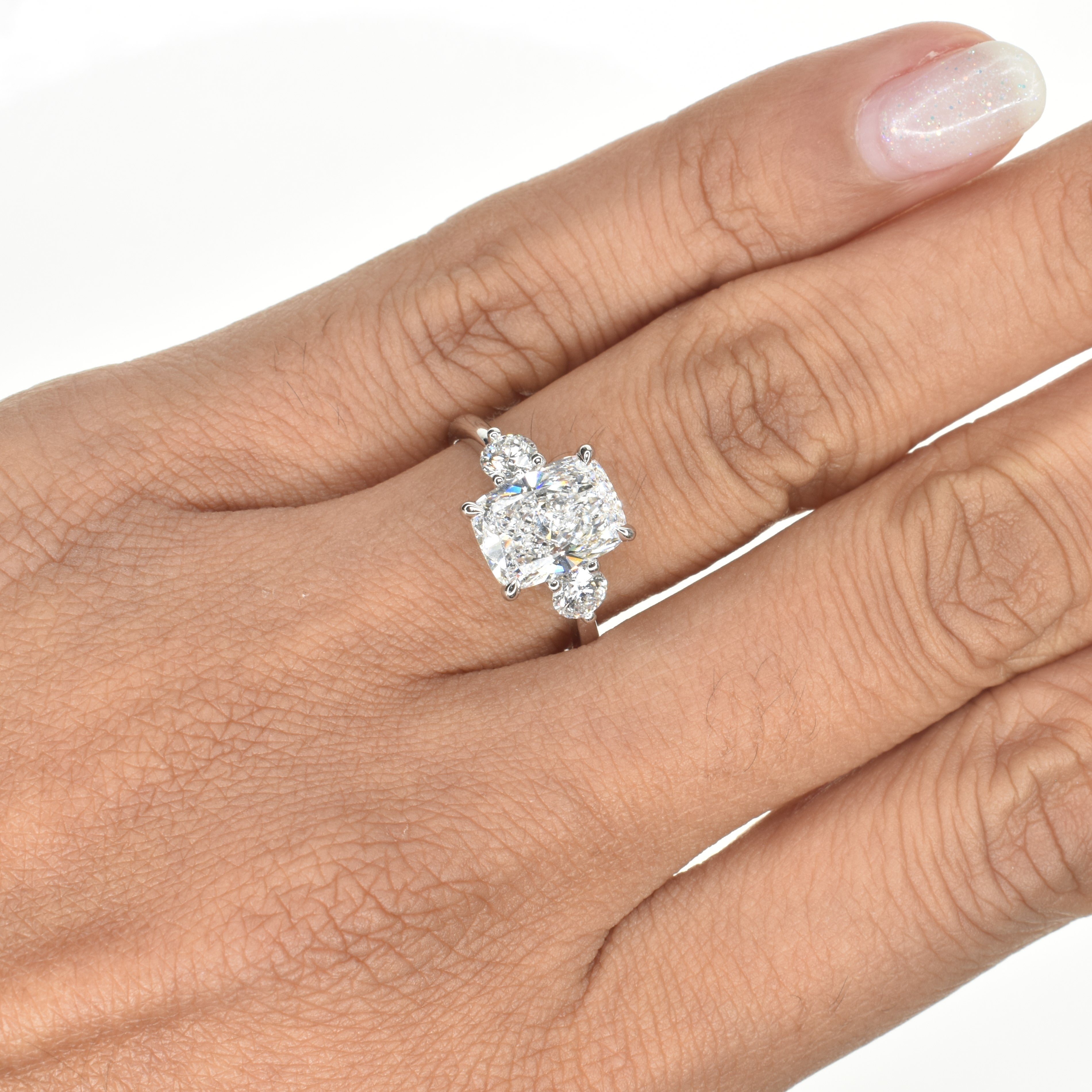 Long Cushion Cut with Round Side stones