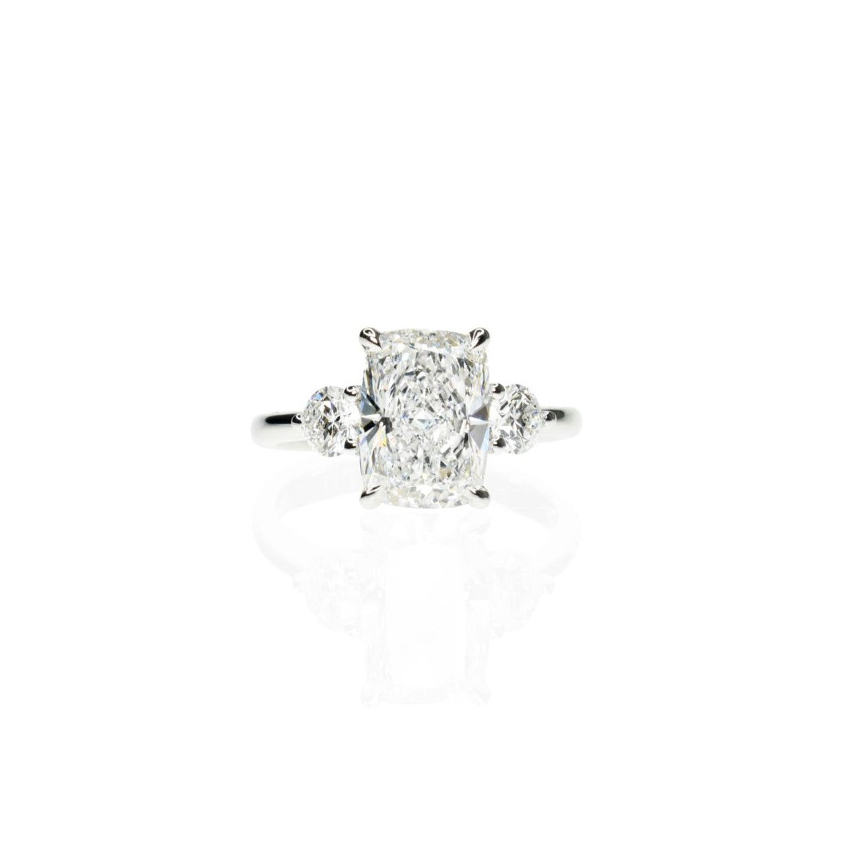 Long Cushion Cut with Round Side stones