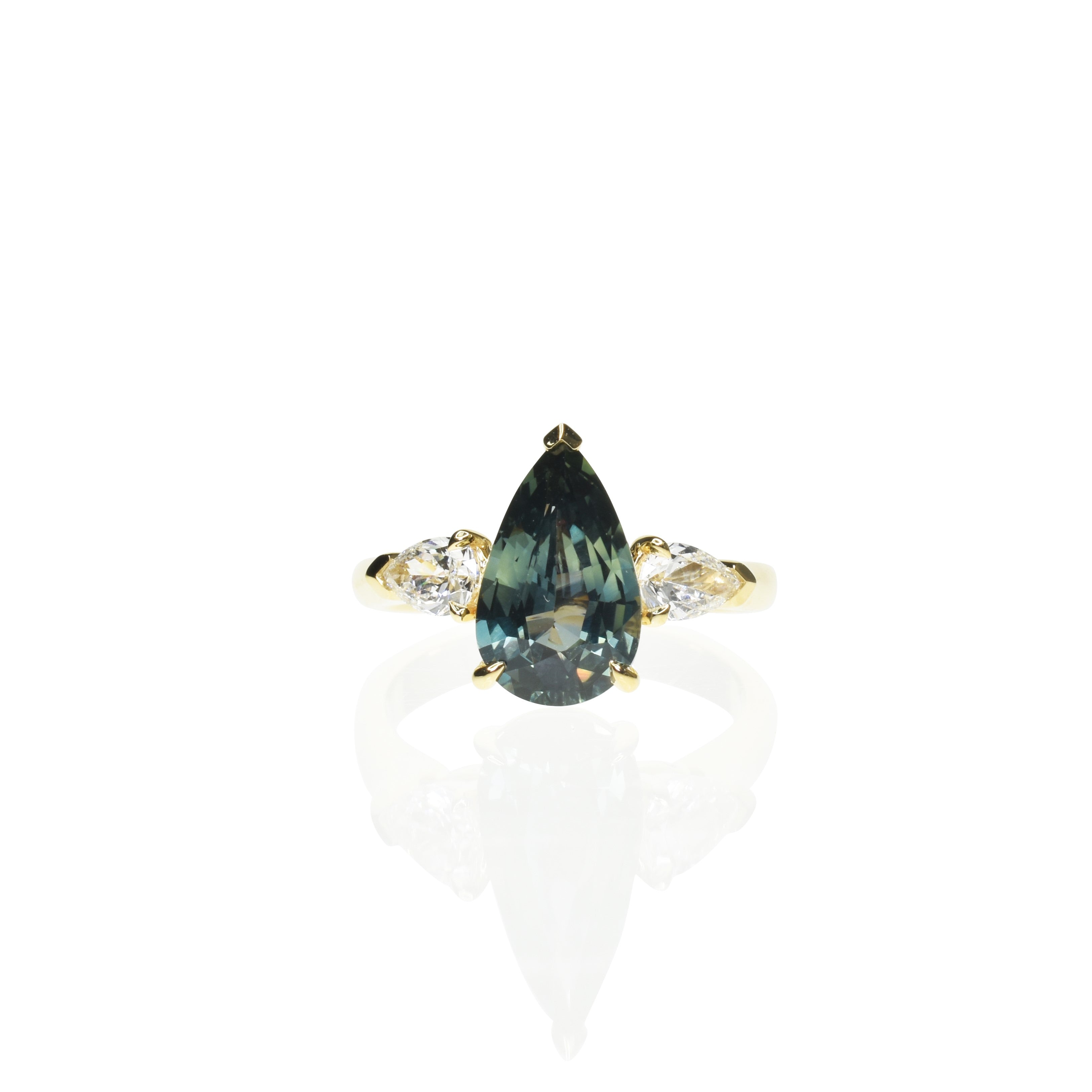 Pear Shape Teal Sapphire Trilogy Ring