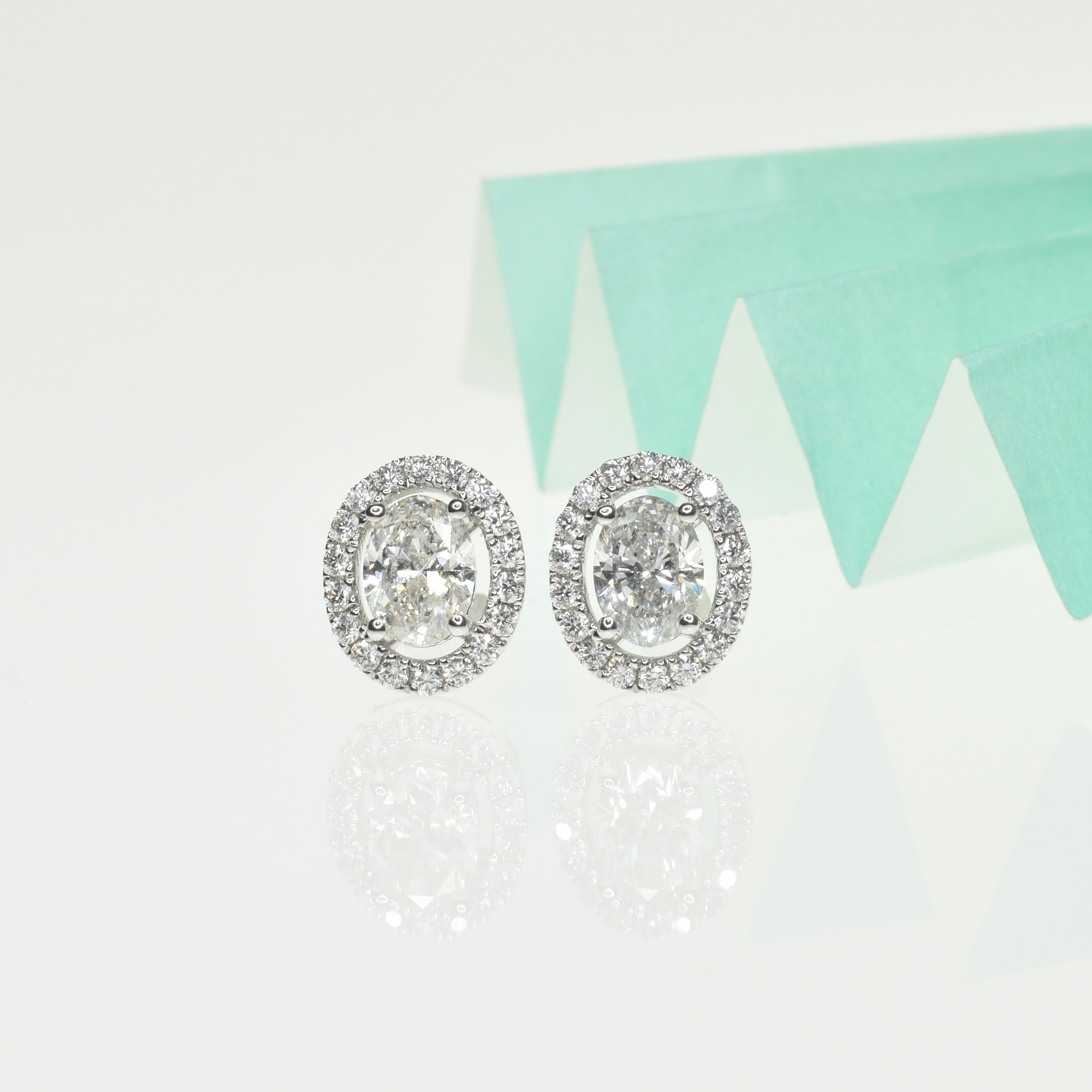Certified Oval Shaped Diamond Halo Earrings