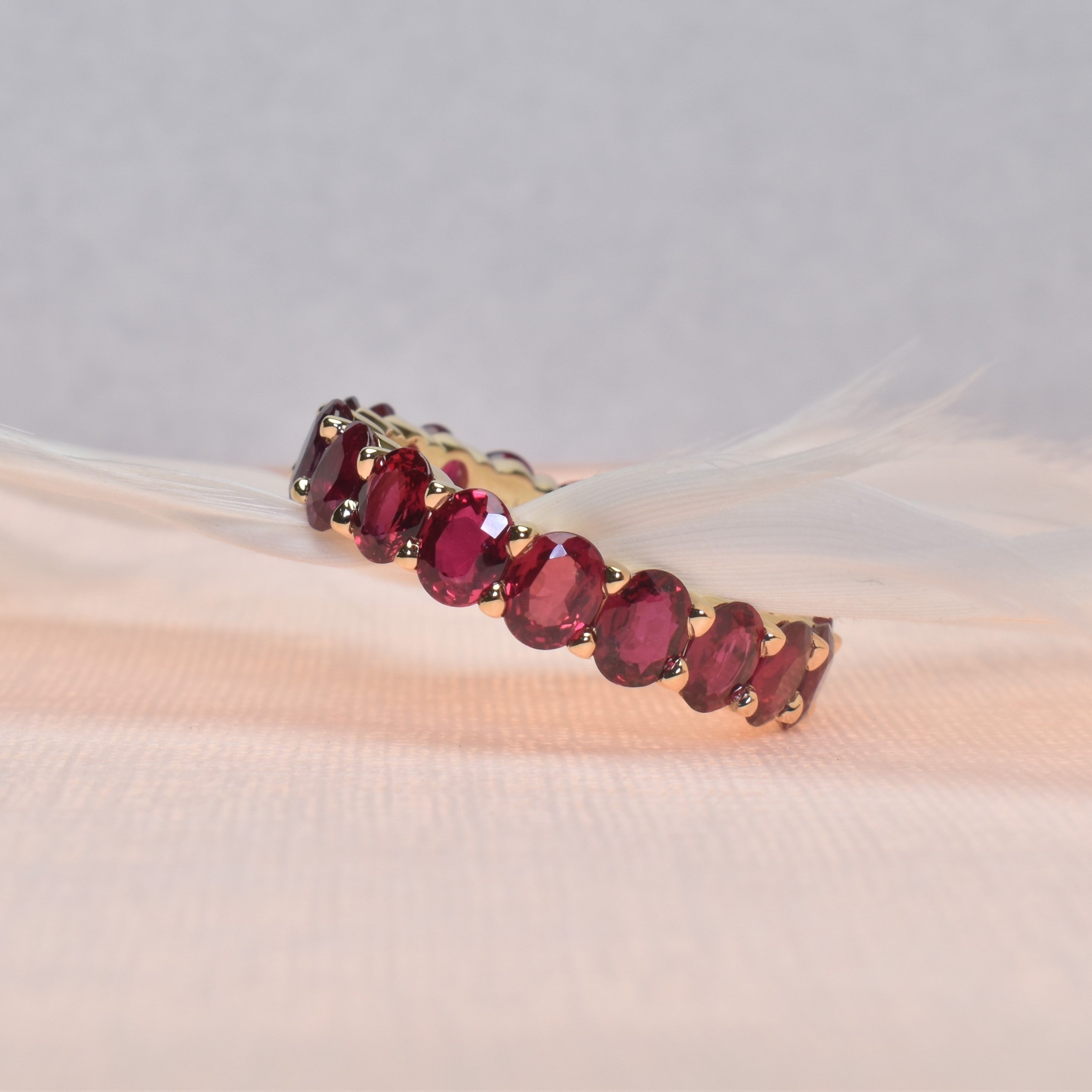 Oval Shaped Ruby Eternity Band
