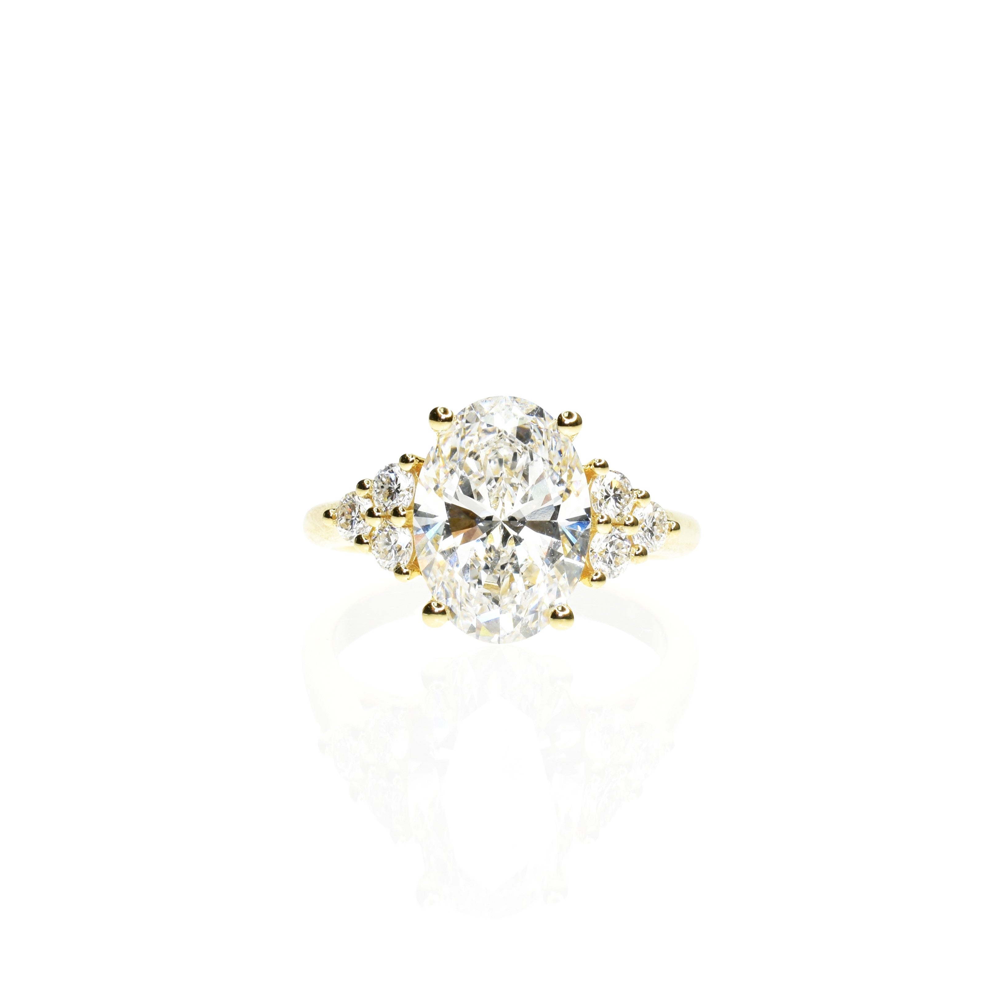 3ct Oval Cut Engagement Ring with Round Diamond Cluster