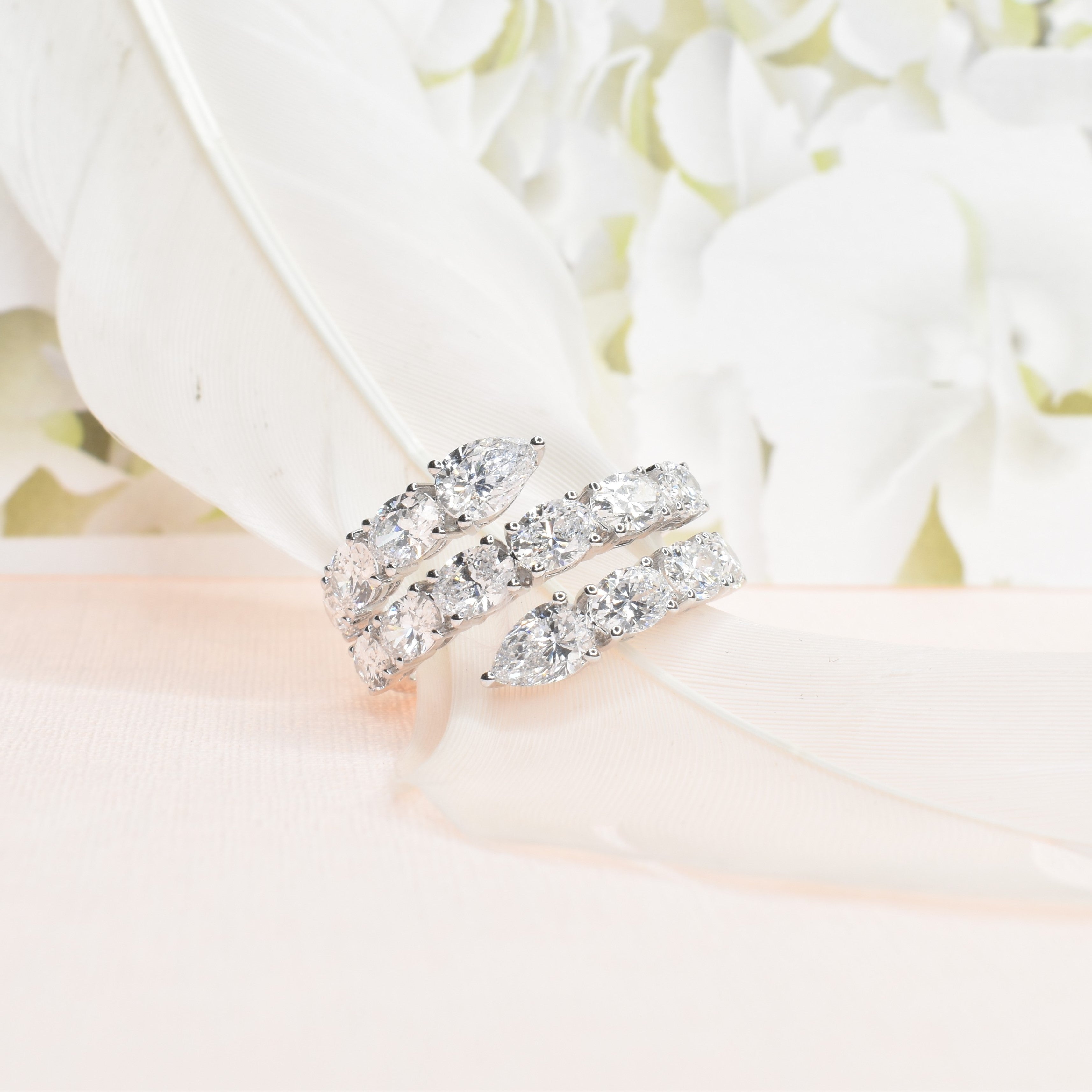 Coiled Cocktail Ring With Pear and Oval Diamonds