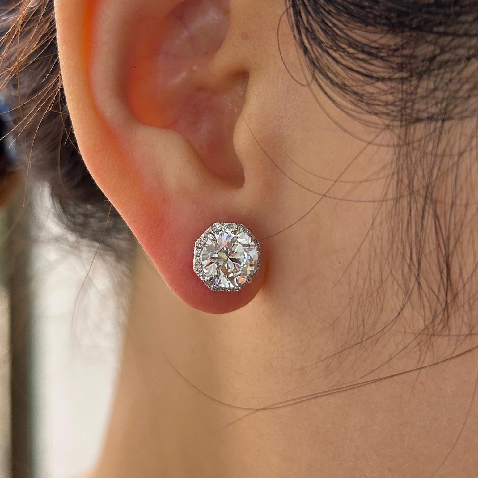 Round Diamond studs with Hexagonal halo
