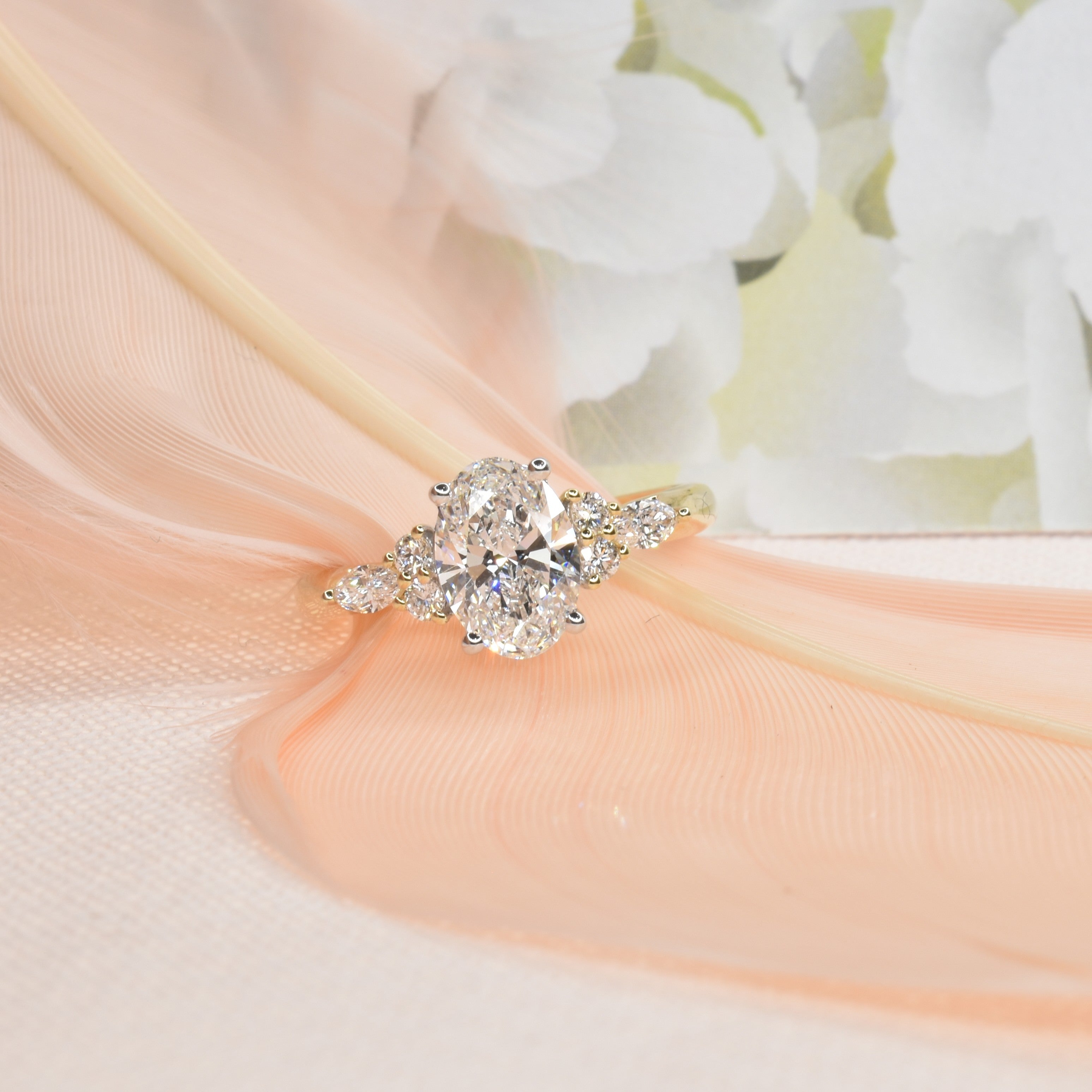 Oval Diamond Engagement Ring with Diamonds on Shoulder