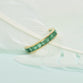 Channel Set Emerald Eternity Band