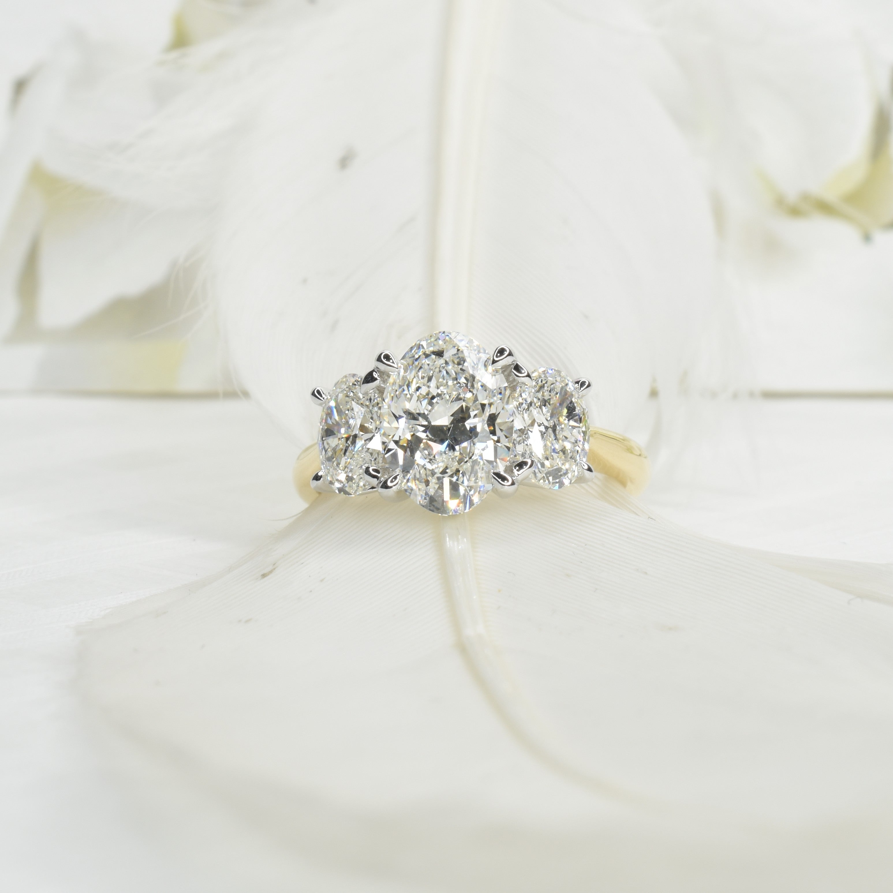 1.70ct Oval Trilogy Ring with Floral Basket