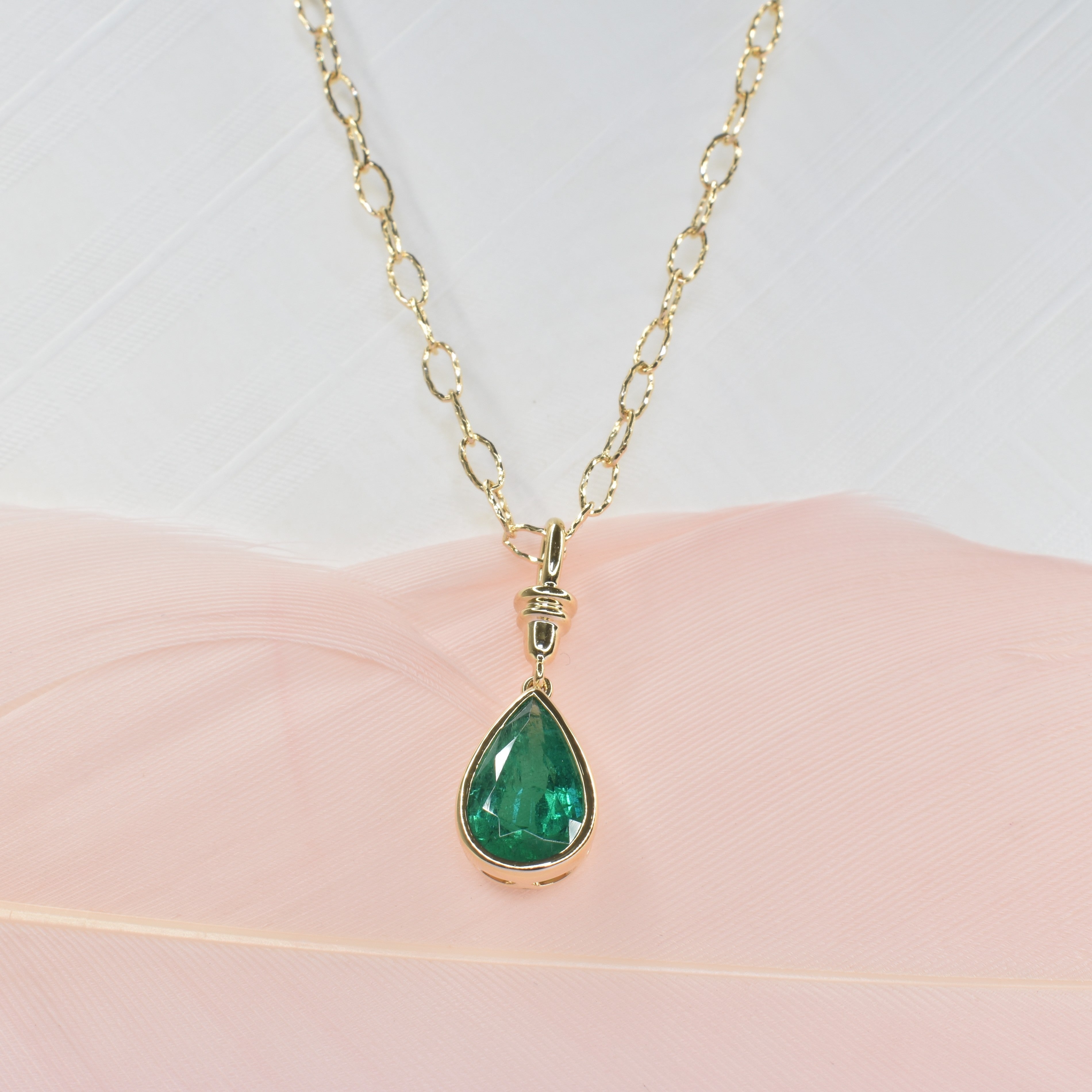 Pear Shape Emerald Pendant in Bezel