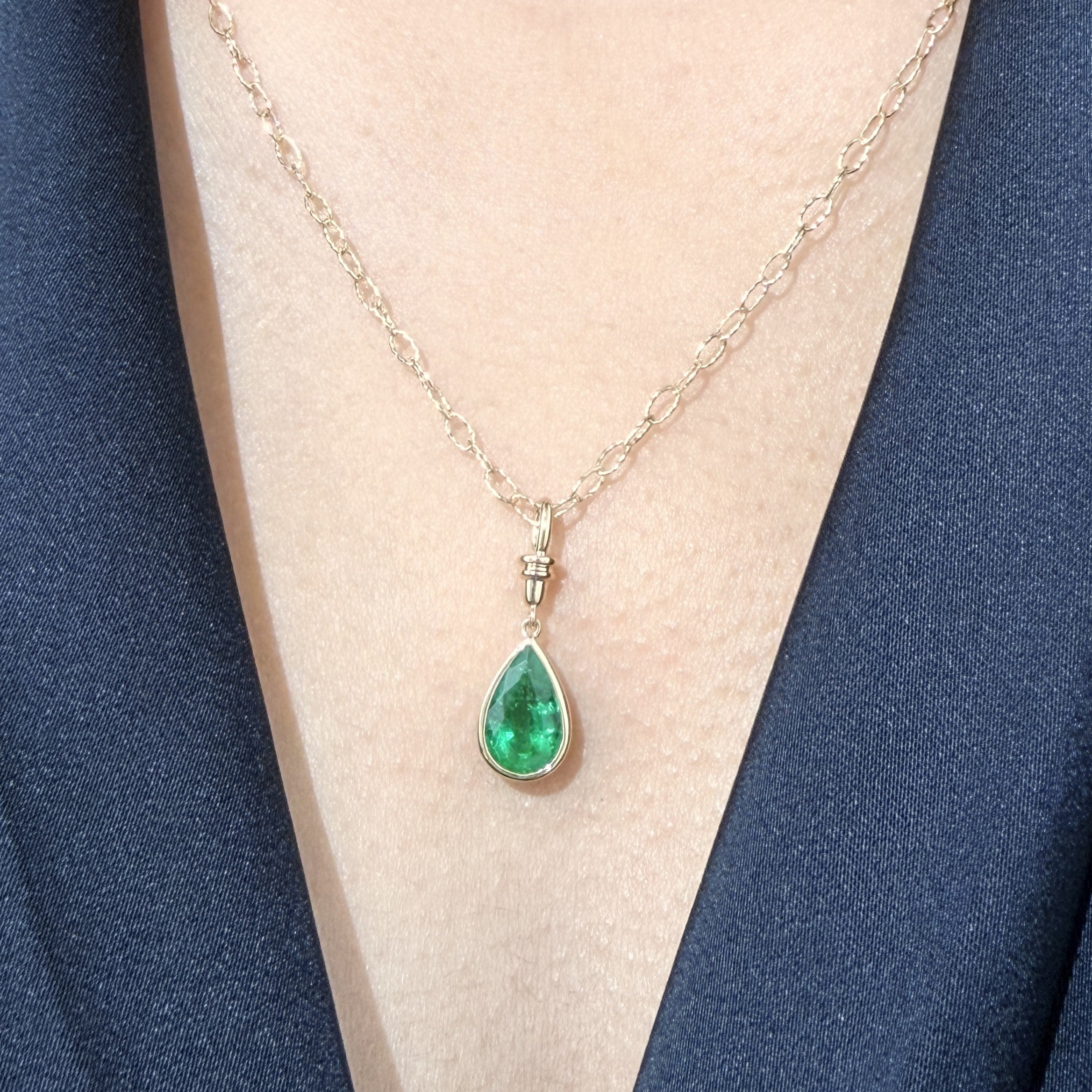 Pear Shape Emerald Pendant in Bezel
