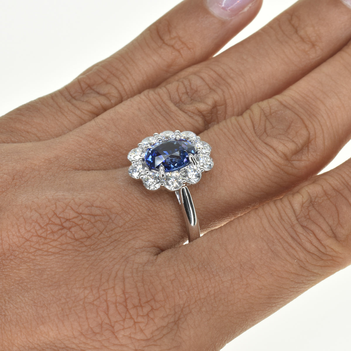 Oval Sapphire Ring with Diamond Halo