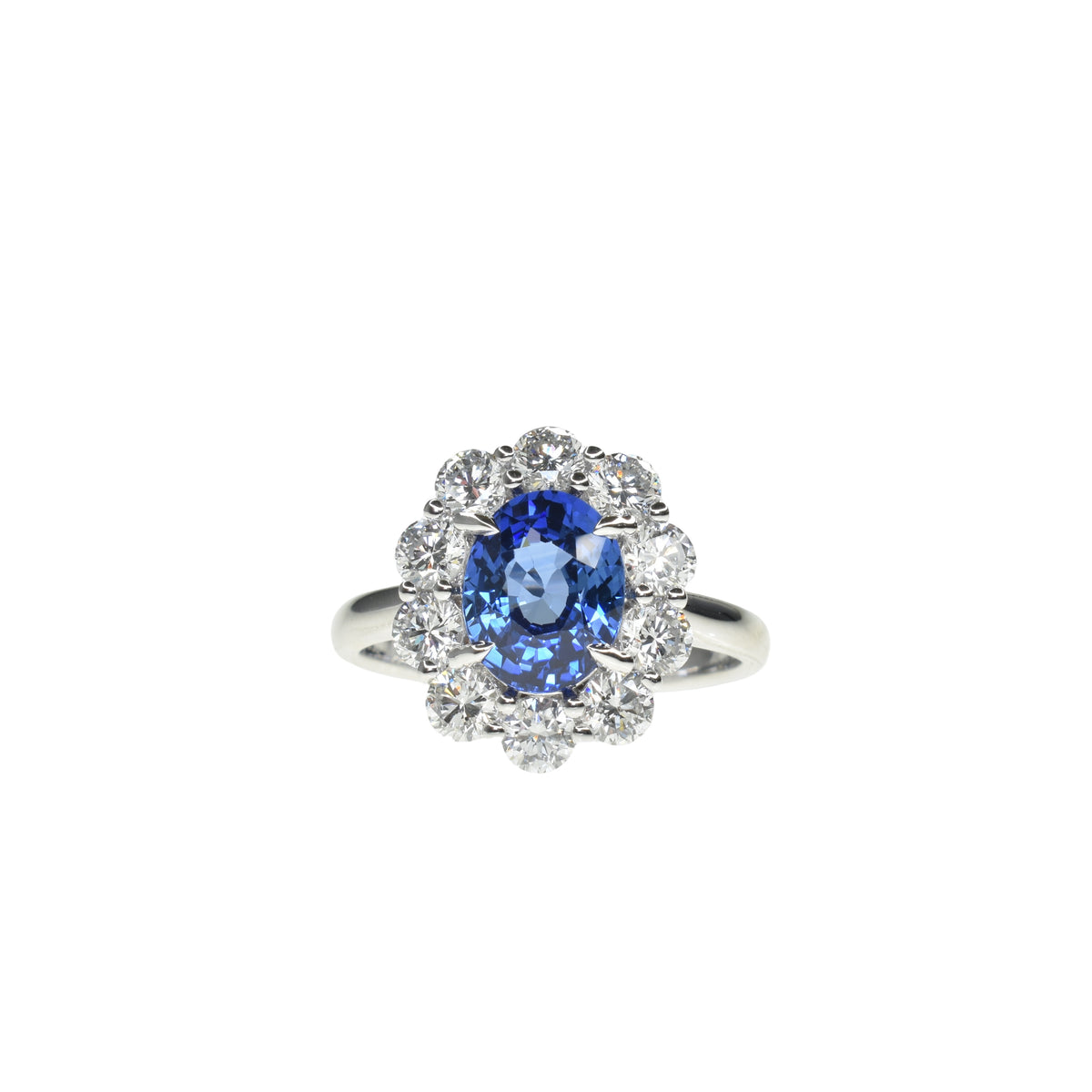 Oval Sapphire Ring with Diamond Halo