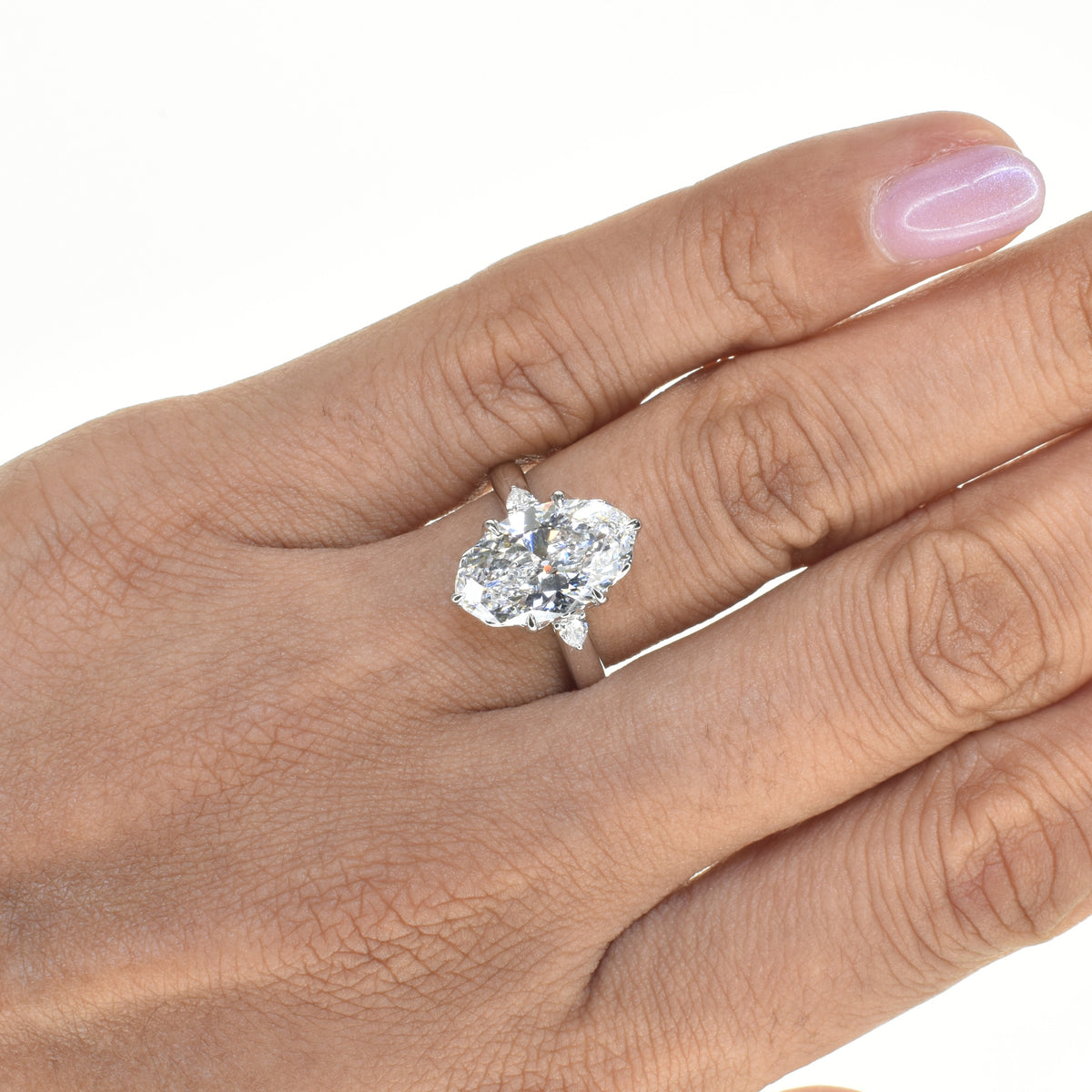 3ct Moval Trilogy Engagment Ring with Pear Shapes