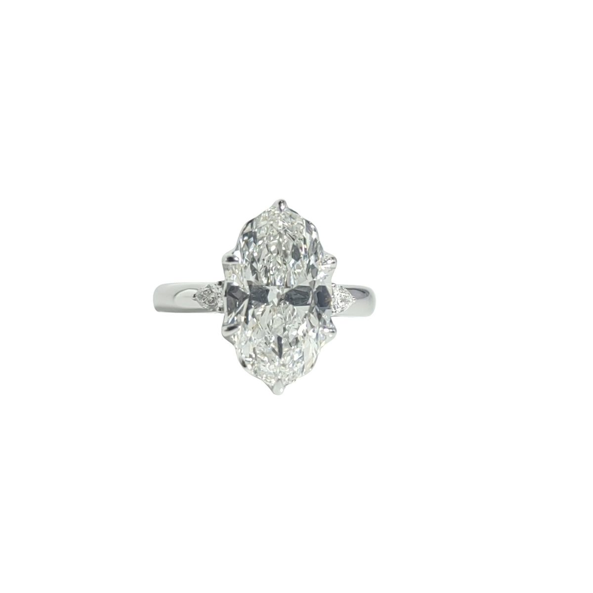 3ct Moval Trilogy Engagment Ring with Pear Shapes