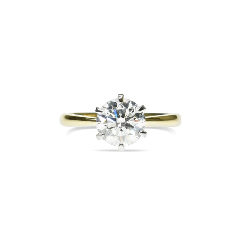 Classic Round Diamond Ring with a Tapered Band