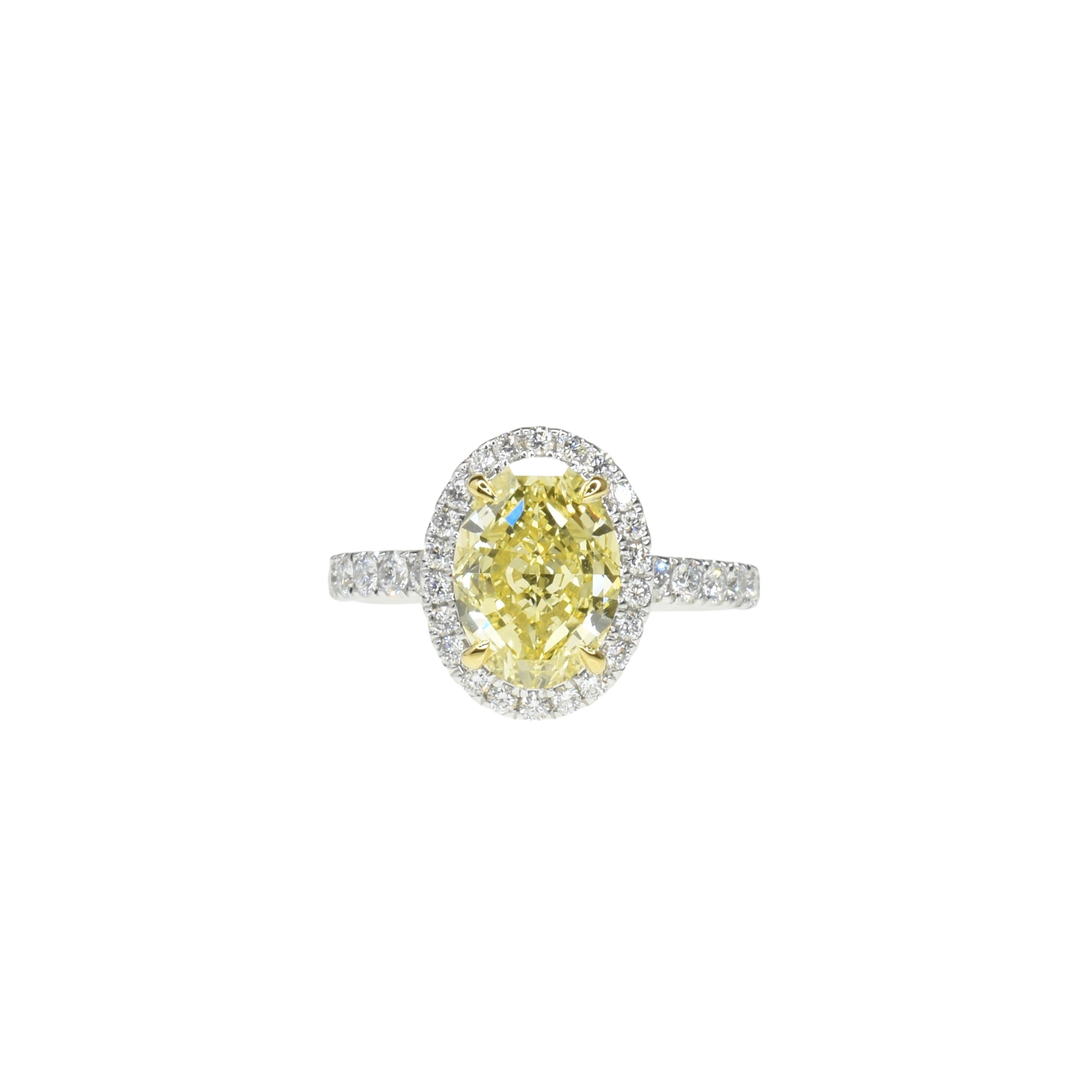 Fancy Intense Yellow Oval Diamond Ring with Halo