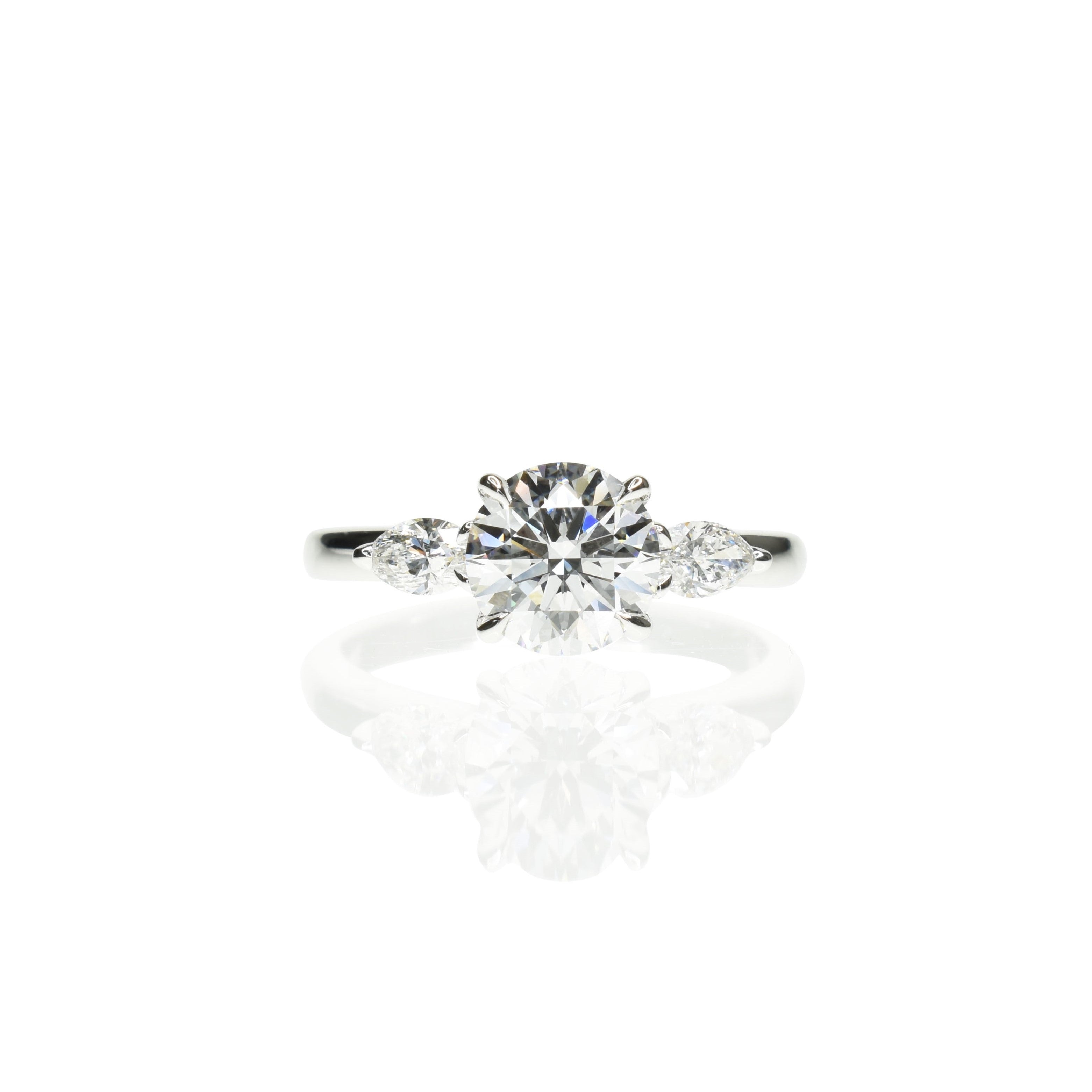 Classic Round Diamond Engagement ring with Marquise Side Diamonds