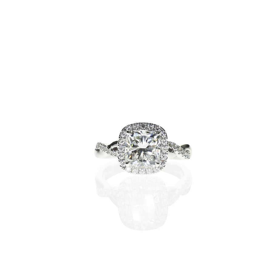 Cushion Cut Ring with a Halo and Twisted Band