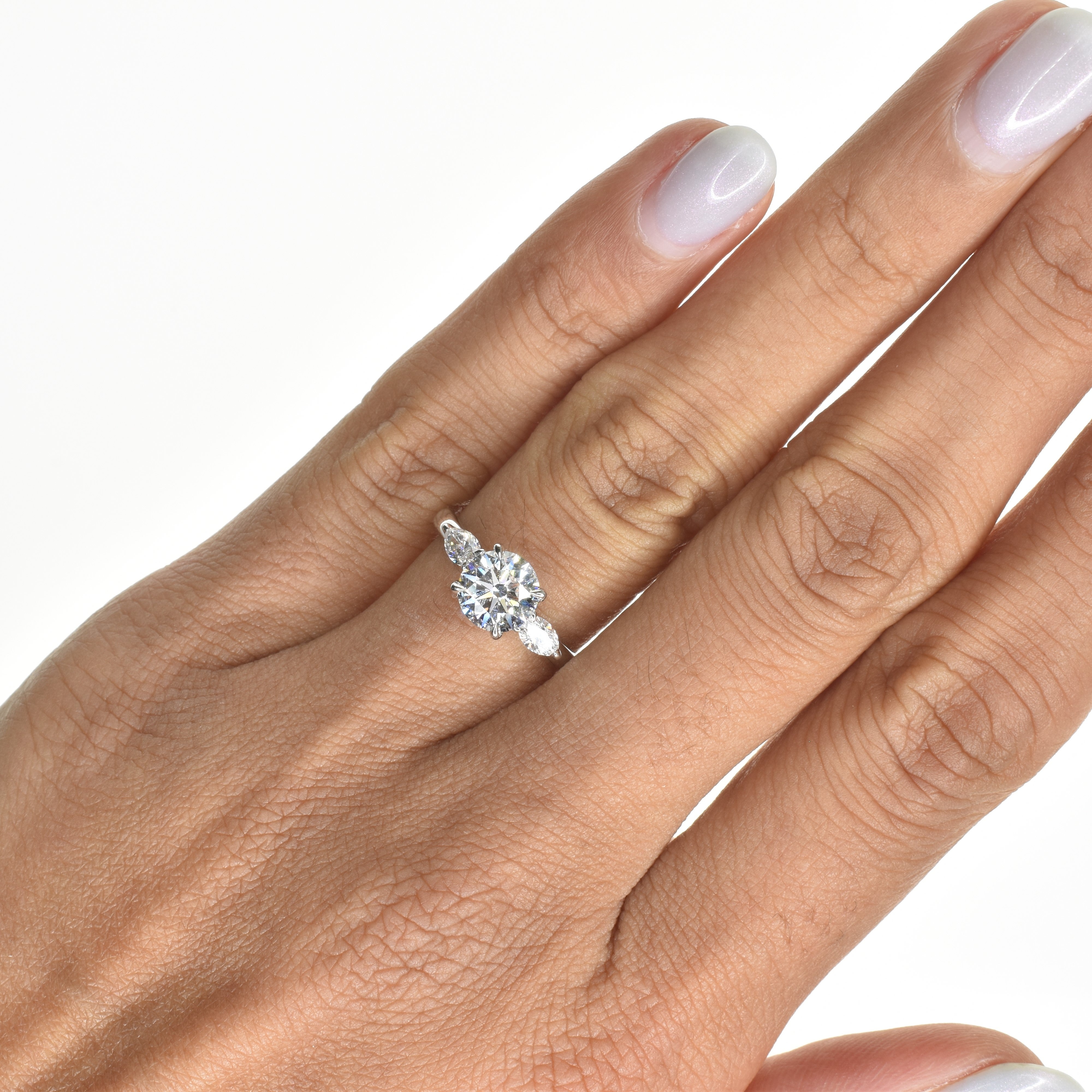 Classic Round Diamond Engagement ring with Marquise Side Diamonds