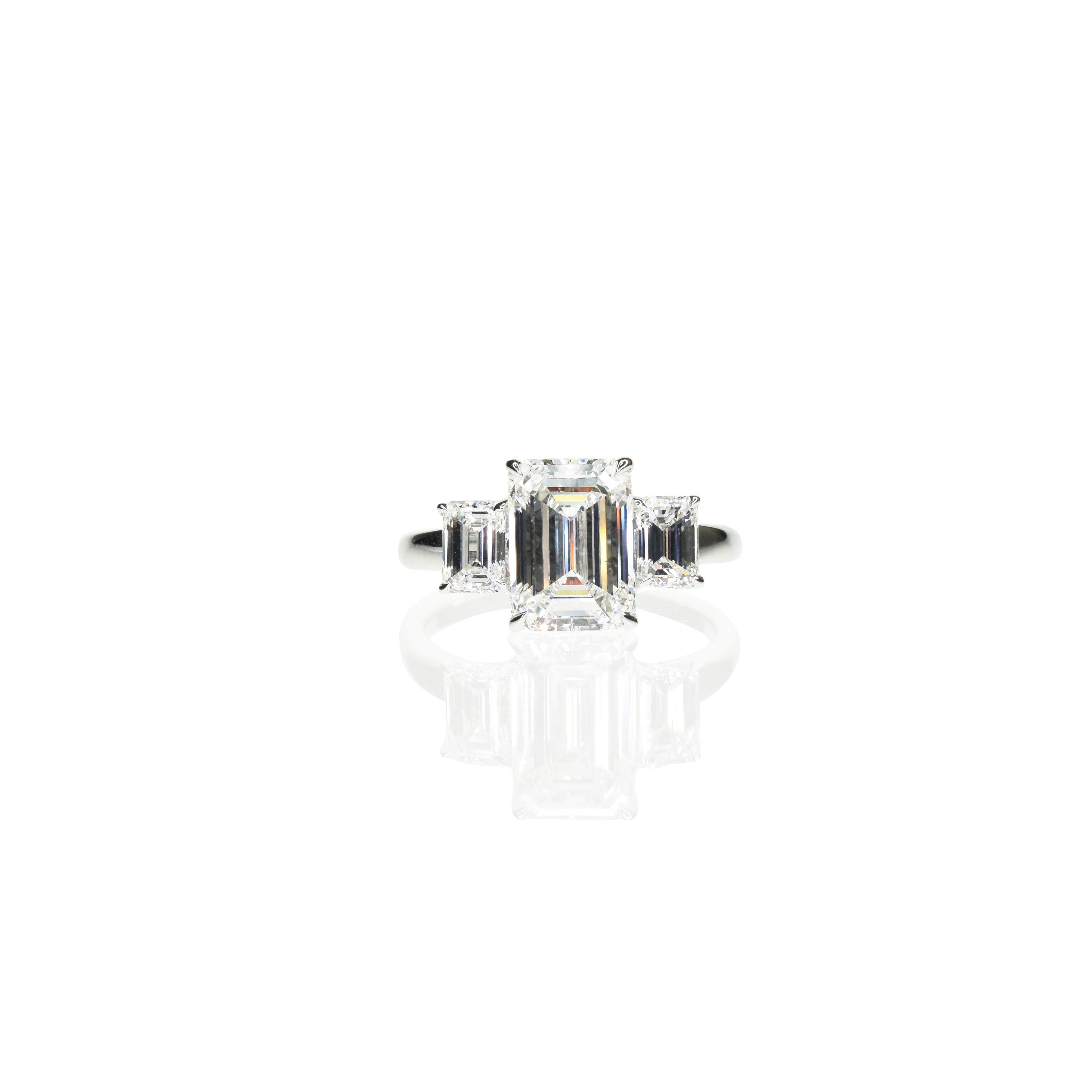 Emerald cut Triology Ring