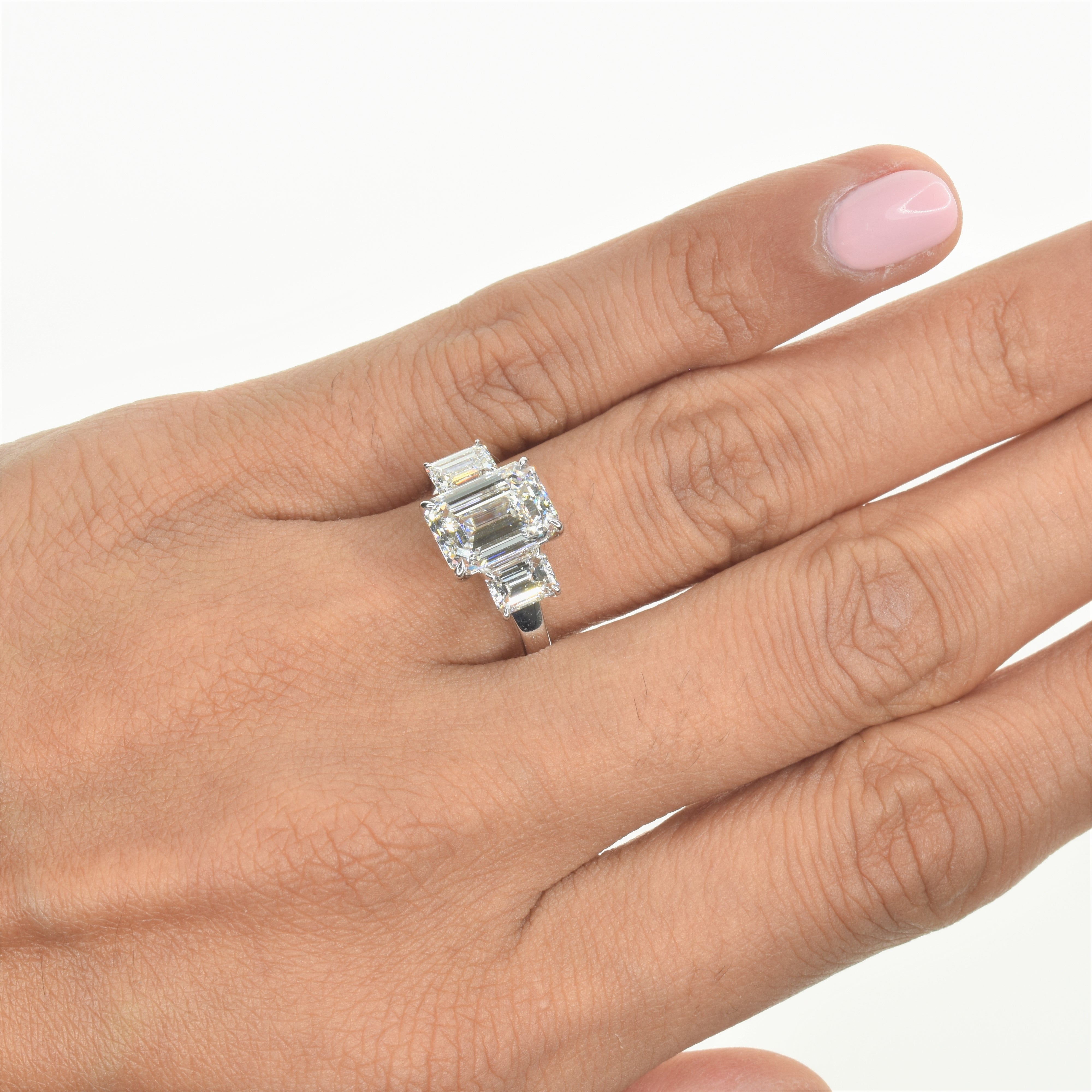 Emerald cut Triology Ring