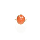 Coral ring with pear shaped diamonds