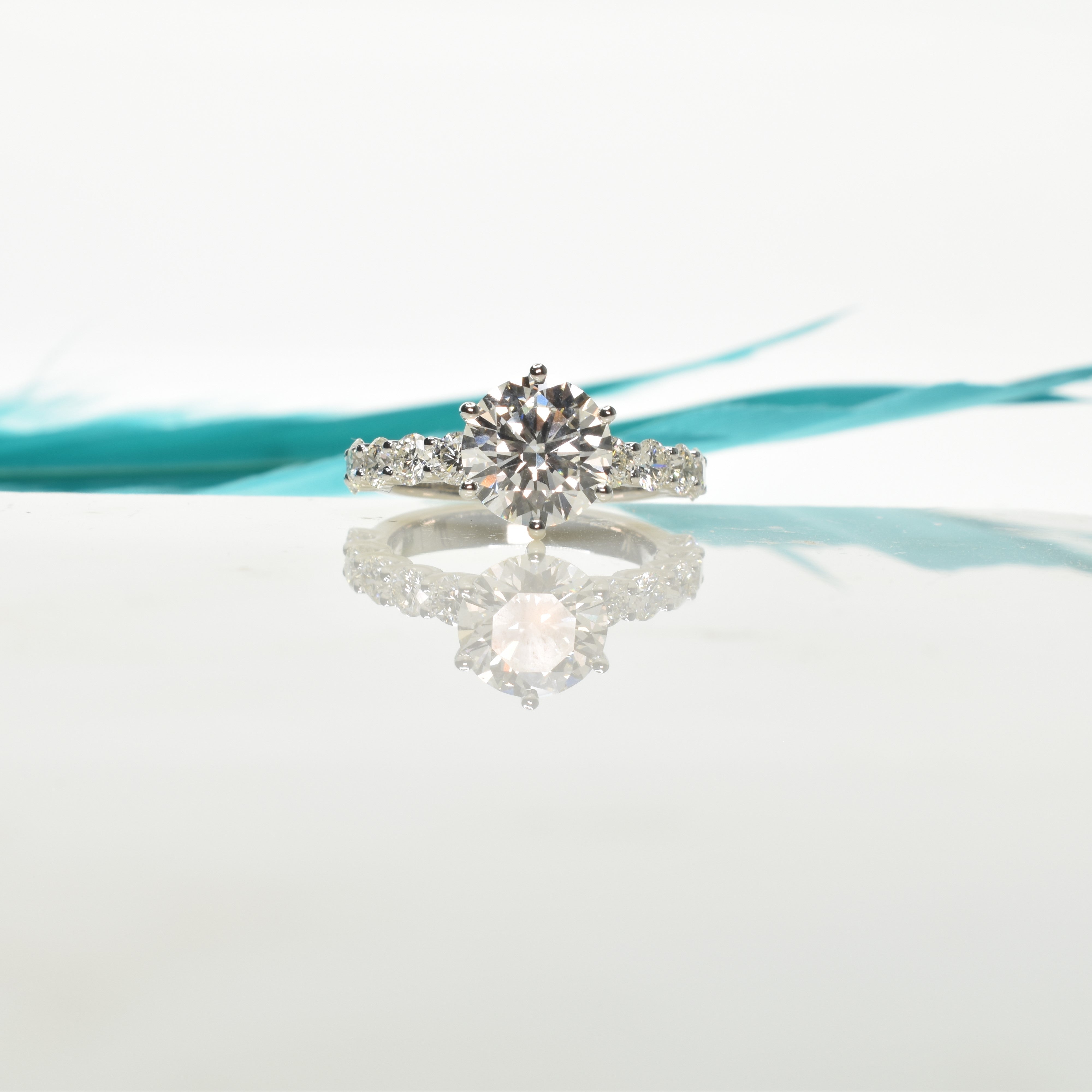 Round Diamond Ring with a Pavé Diamond Band