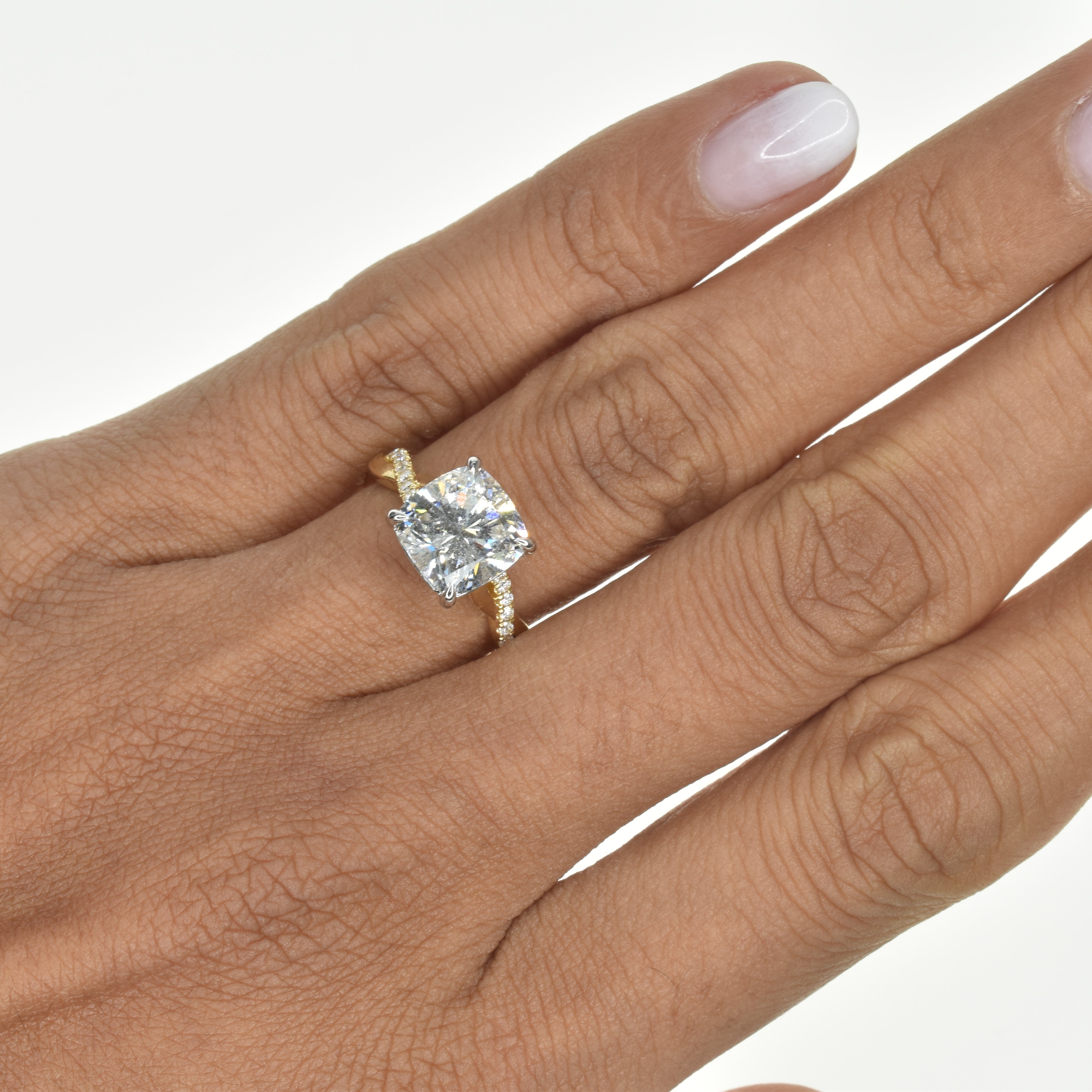 Cushion Cut Engagement Ring with a Twisted Band